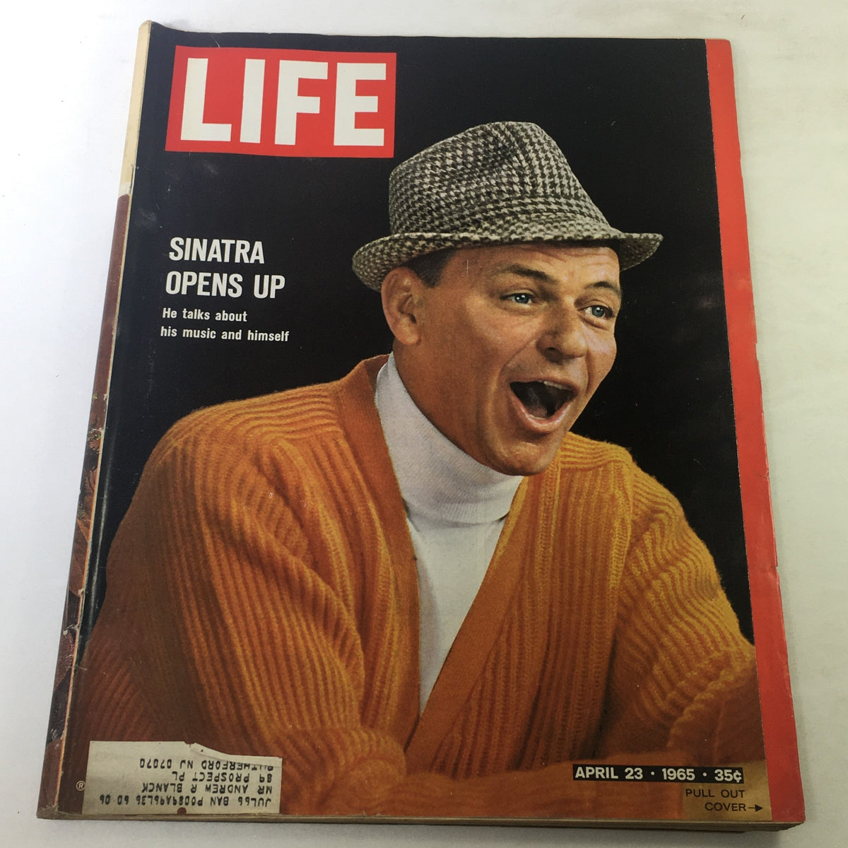 Vintage Life Magazine cover from April 23, 1965, featuring Frank Sinatra. The cover highlights the title 'Sinatra Opens Up' with a photo of Sinatra wearing a hat and an orange sweater, discussing his music and personal life.