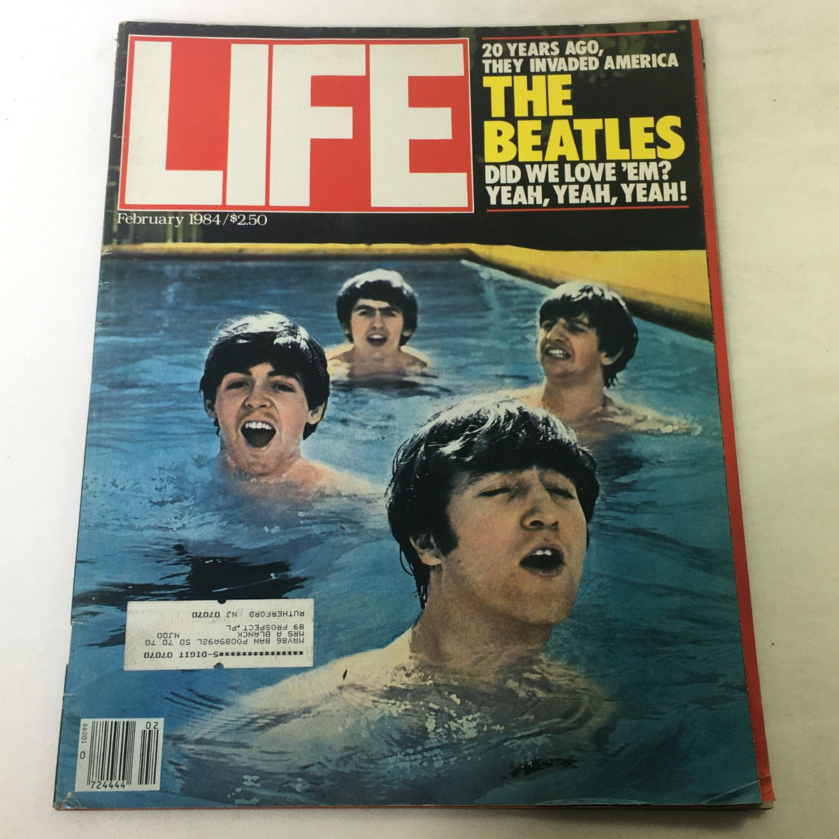 Cover of VTG Life Magazine February 1984 featuring The Beatles, celebrating 20 years since their debut in America, showcasing iconic images of the band sectioned in a swimming pool.
