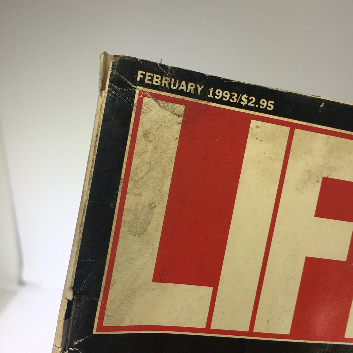 Close-up of the top corner of Life Magazine February 1993, displaying the magazine's date and price, alongside the iconic 'LIFE' logo.