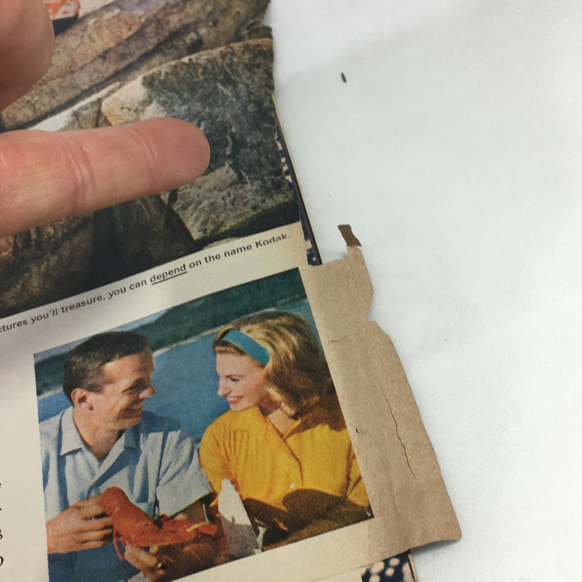 Interior page of Life Magazine, August 23, 1963, showing a couple smiling while holding a lobster, along with a Kodak film article.