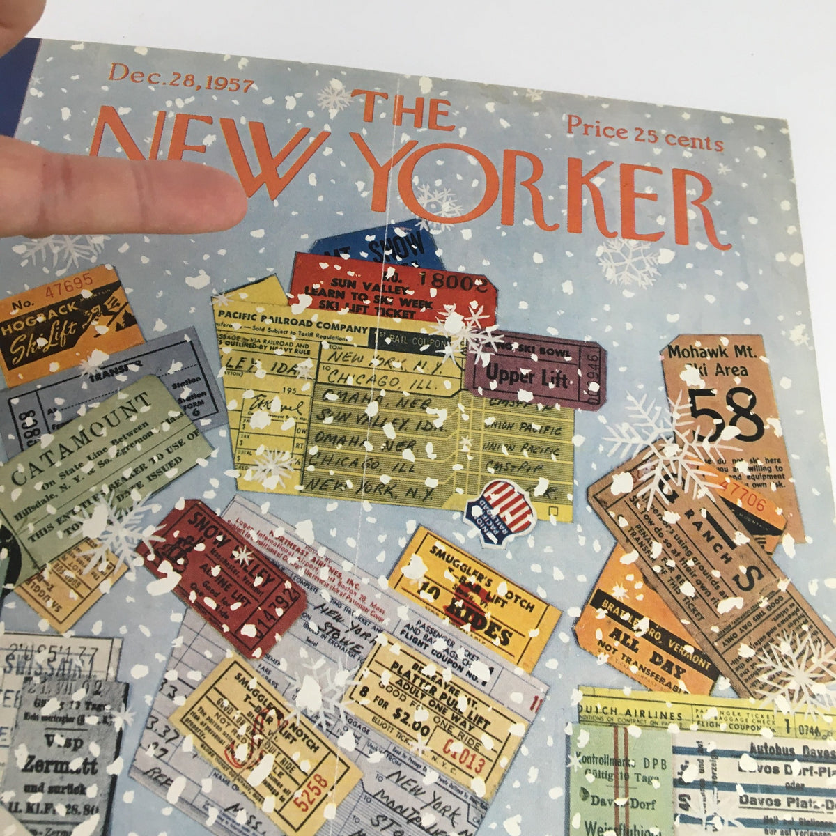 Close-up of The New Yorker December 28 1957 cover displaying intricate ticket illustrations and snowflakes, designed by Ilonka Karasz.