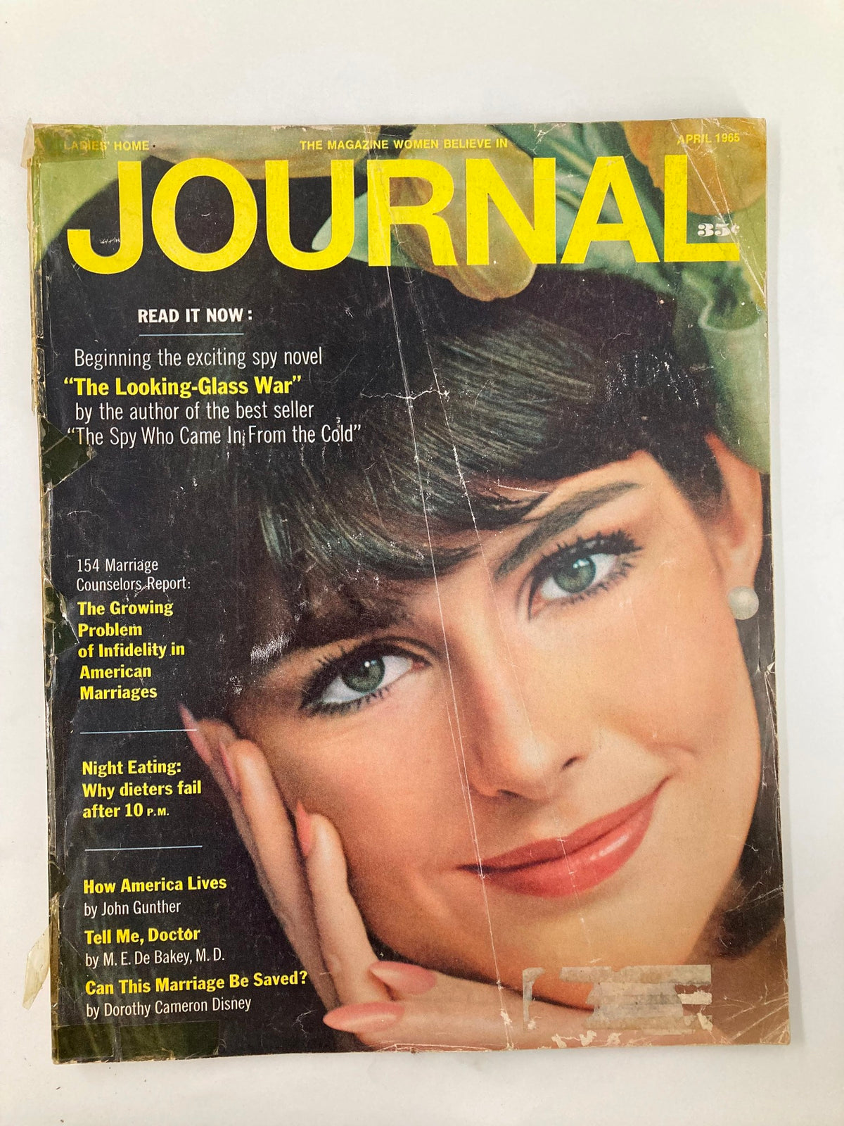 Cover of the VTG Ladies' Home Journal Magazine April 1965, featuring the cover story 'The Growing Problem of Infidelity in American Marriages' with a close-up of a woman's face and text highlighting various articles.