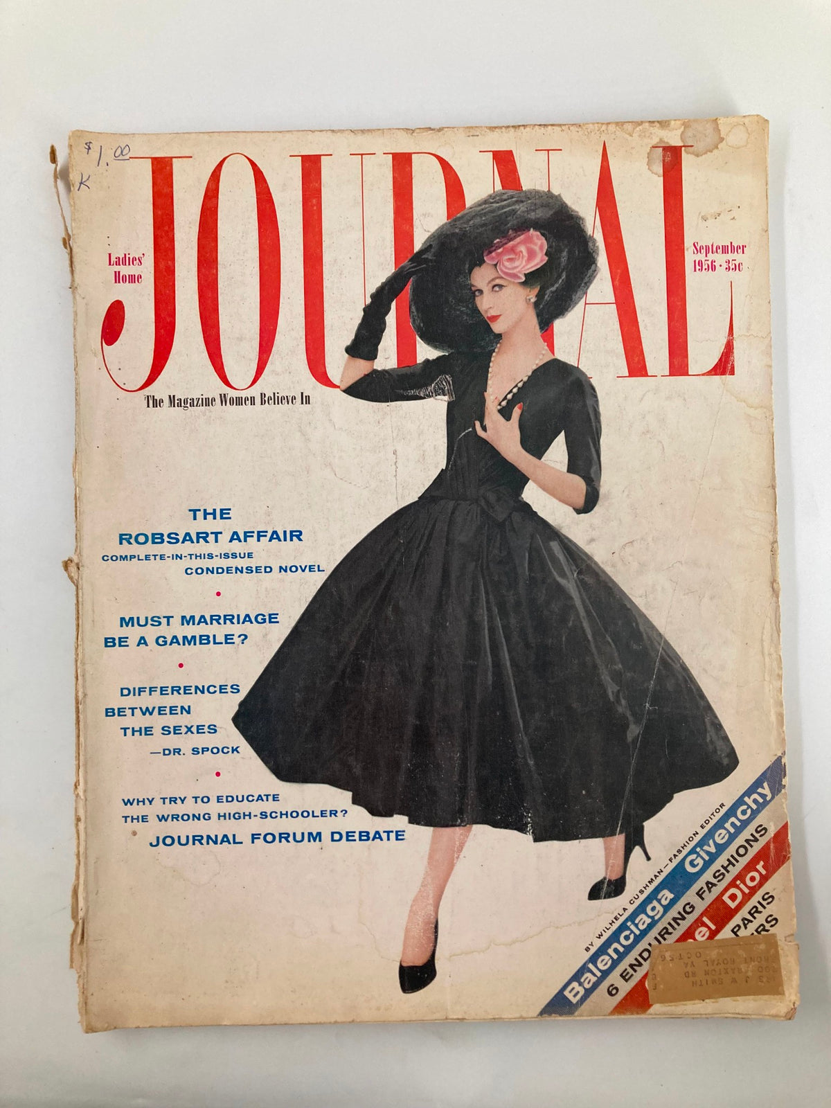 Cover of the Ladies' Home Journal Magazine from September 1956 titled 'Must Marriage Be A Gamble?'. Features a woman in a stylish black dress and large hat, with vintage advertisements visible.