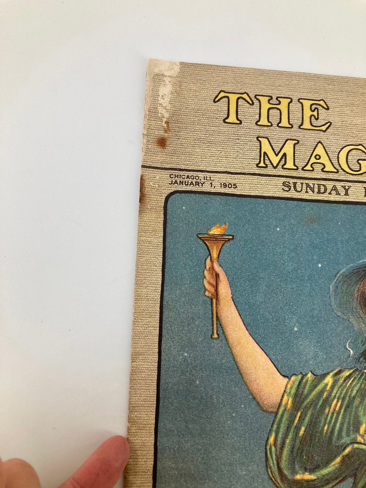 Close-up of the cover corner of VTG The Sunday Magazine January 1 1905, highlighting the date and the minor wear on the magazine.