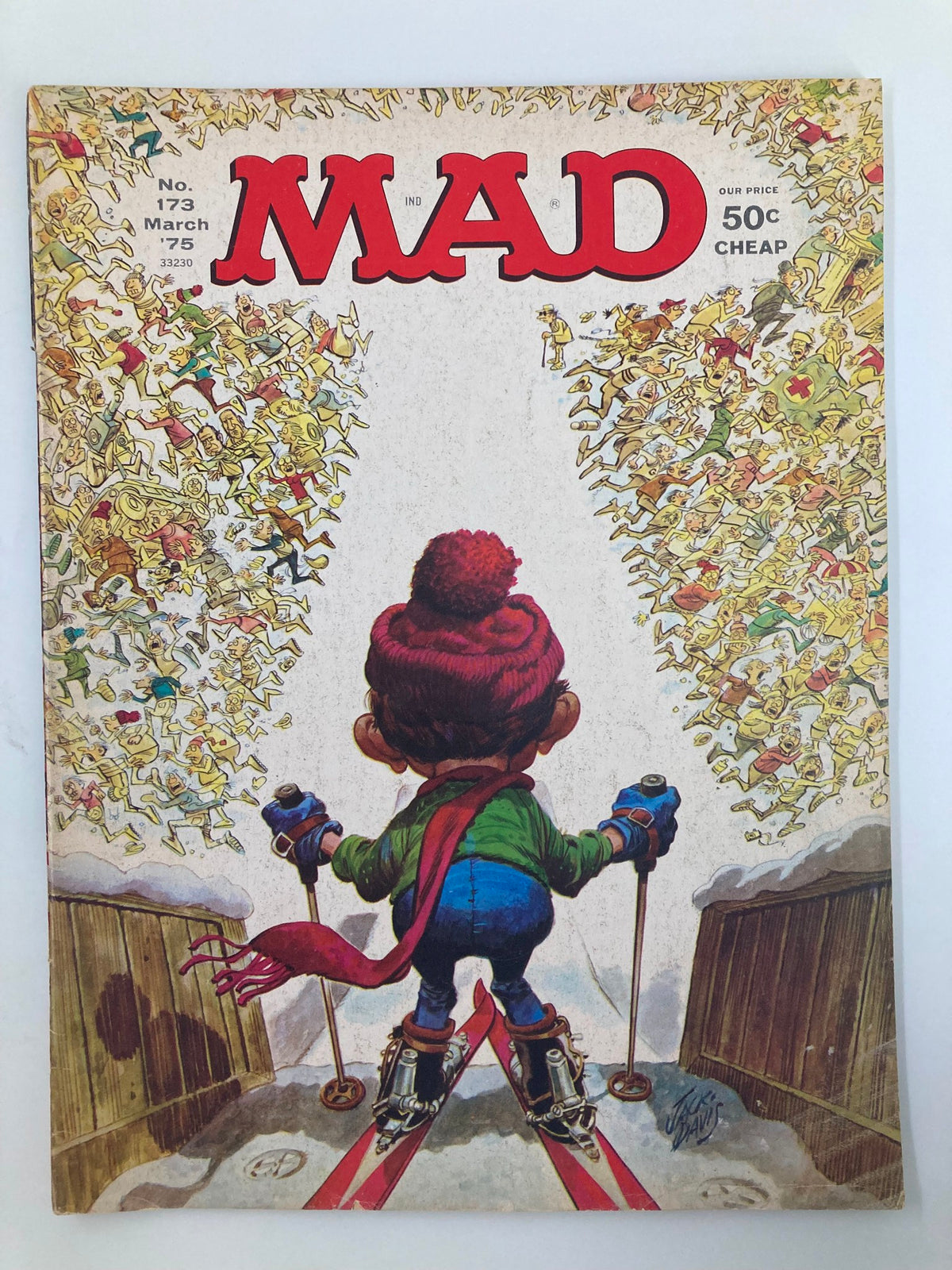 Cover of Mad Magazine March 1975 No. 173 featuring a whimsical illustration of Alfred E. Neuman skiing, surrounded by comedic chaos. This vintage magazine is iconic for its satire and humor from the 1970s.