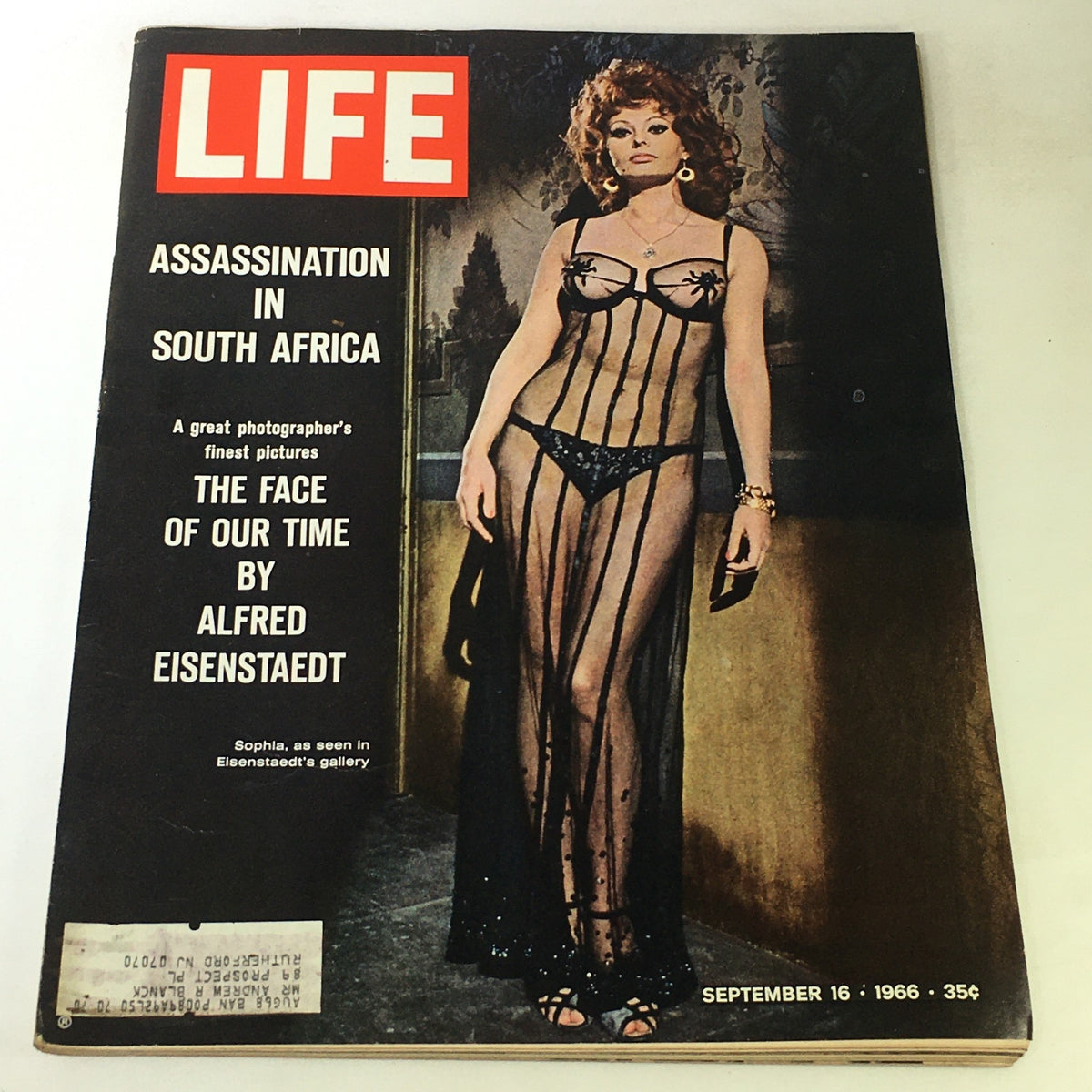 Vintage Life Magazine cover from September 16, 1966, featuring 'The Face Of Our Time' by Alfred Eisenstaedt, showcasing a model in an elegant outfit with a stylish design, reflecting the cultural essence of the 60s.