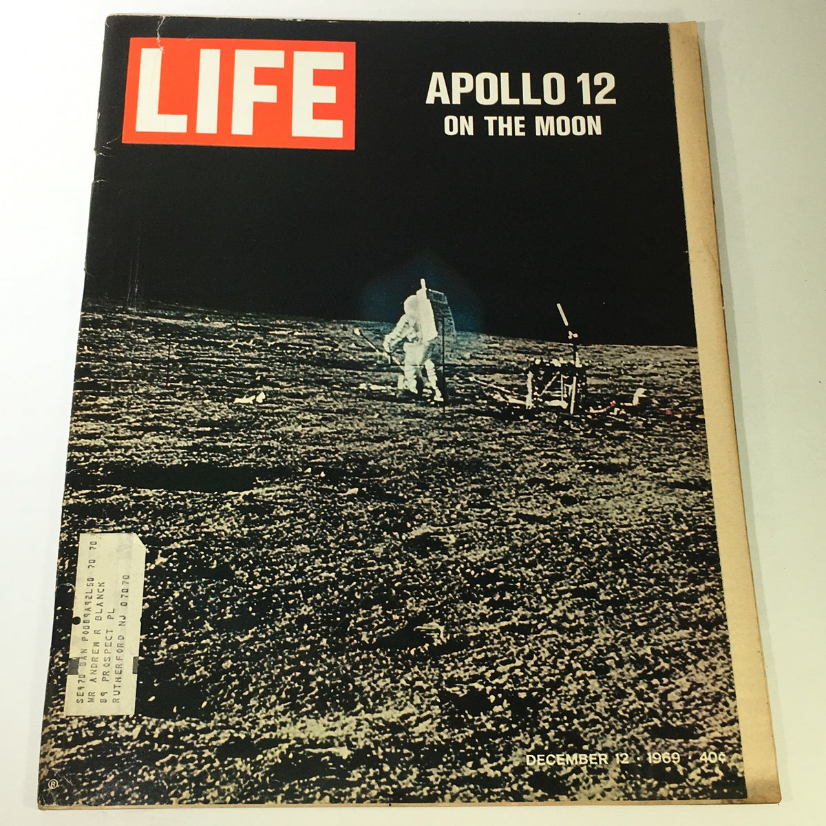 Vintage Life Magazine cover from December 12, 1969, featuring the Apollo 12 mission on the moon, showcasing astronaut exploration.