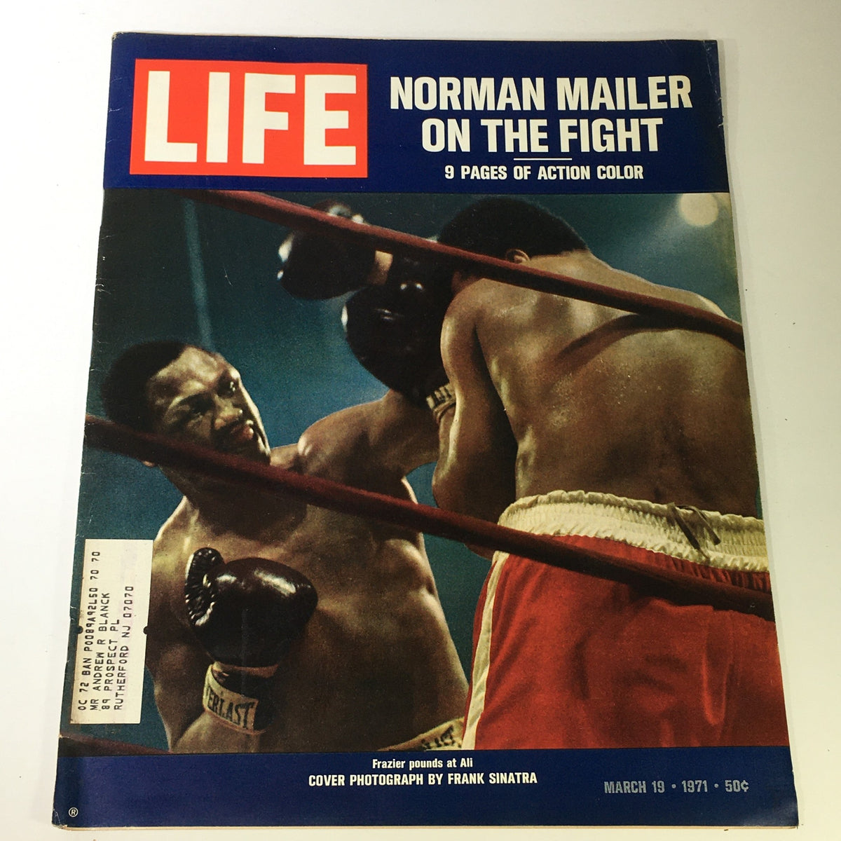 Vintage Life Magazine from March 19, 1971, featuring Joe Frazier pouncing on Muhammad Ali in an iconic boxing match photo, capturing a significant moment in sports history.