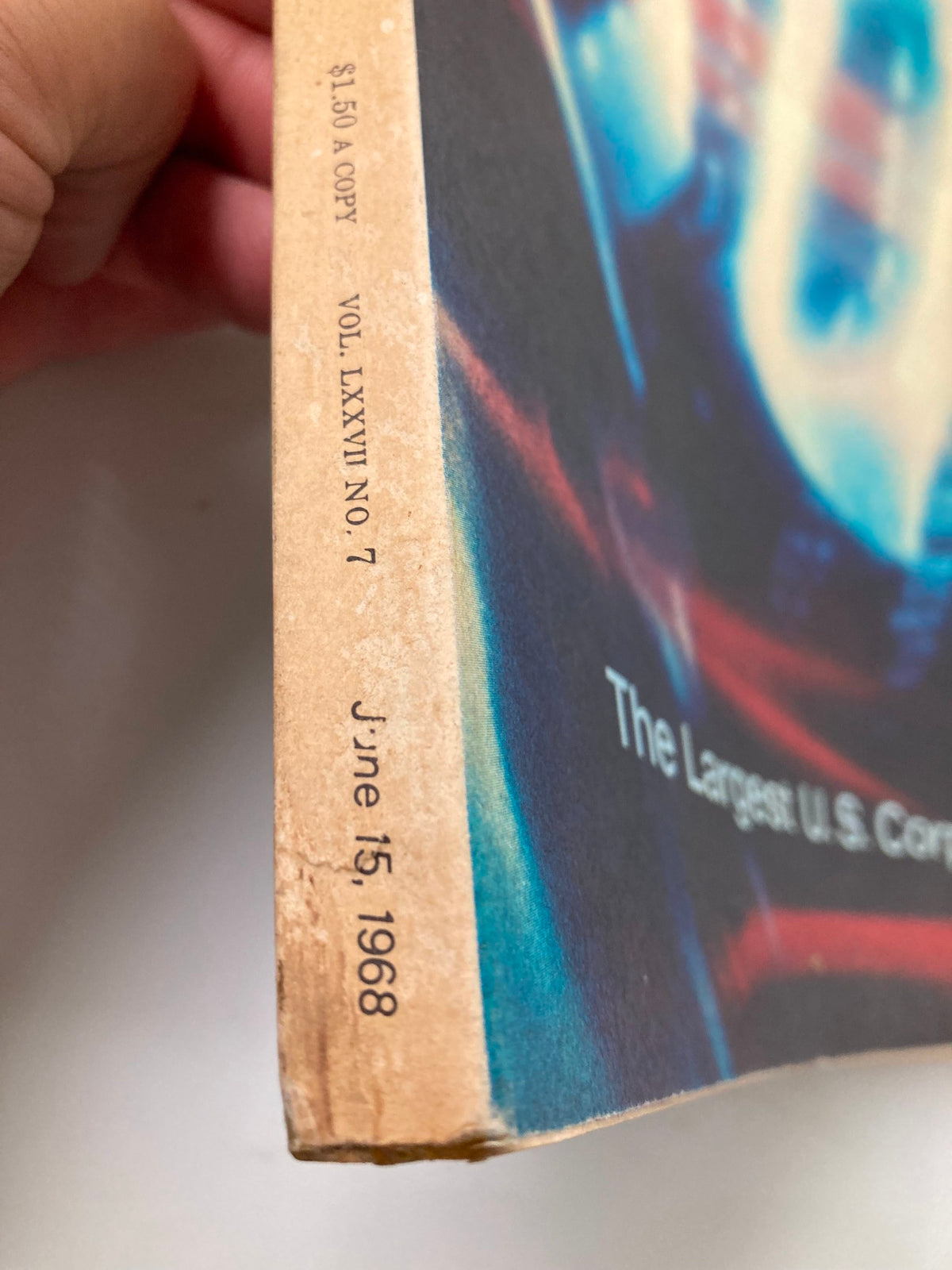 Close-up of the spine of VTG Fortune Magazine June 15 1968, showcasing the date and volume number, highlighting its historical significance as it covers the largest U.S. corporations.