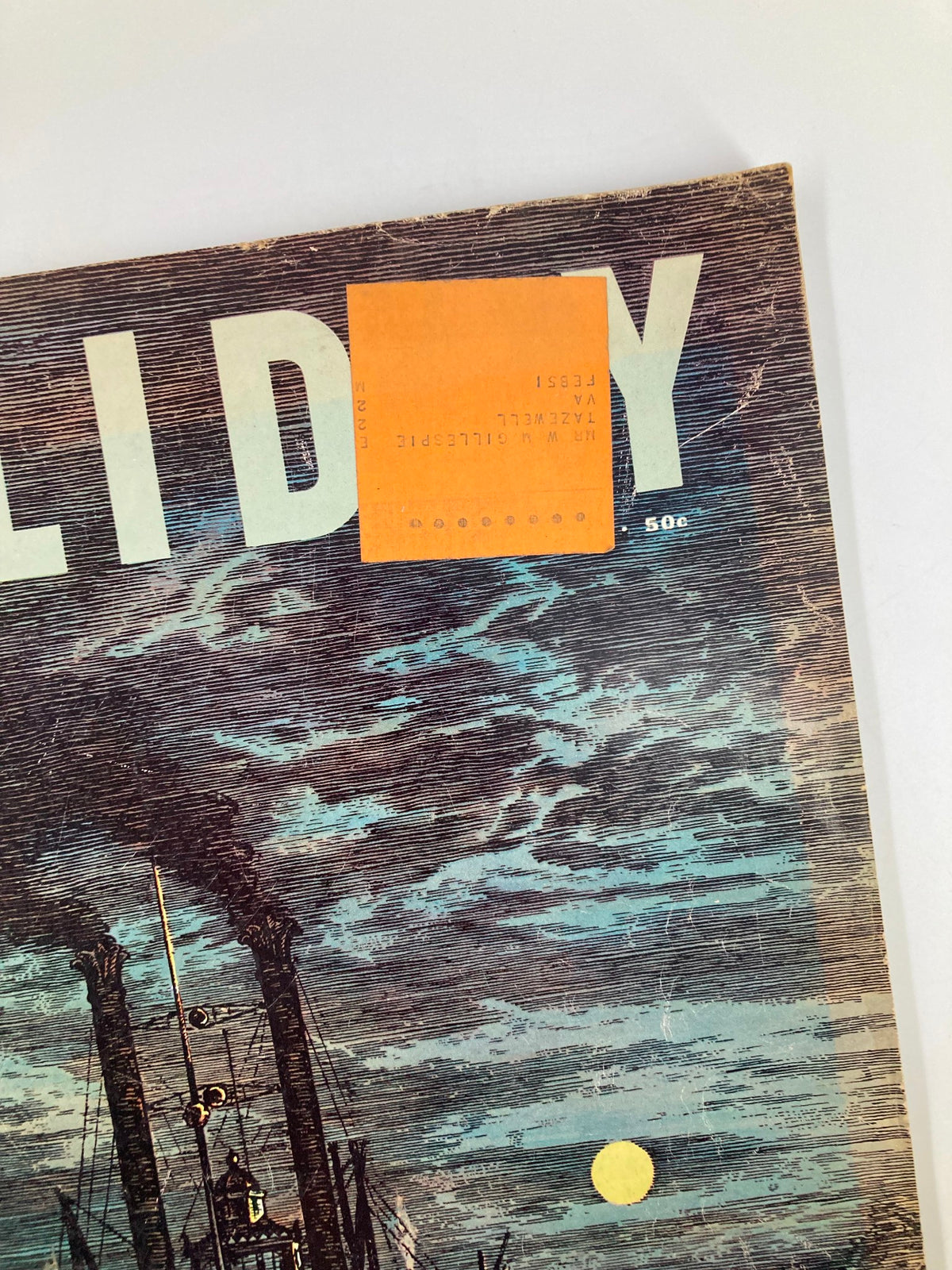 Close-up of the Vintage Holiday Magazine March 1949 Vol 5 #3 Moonlight on the Mississippi cover showing the title with an orange label.