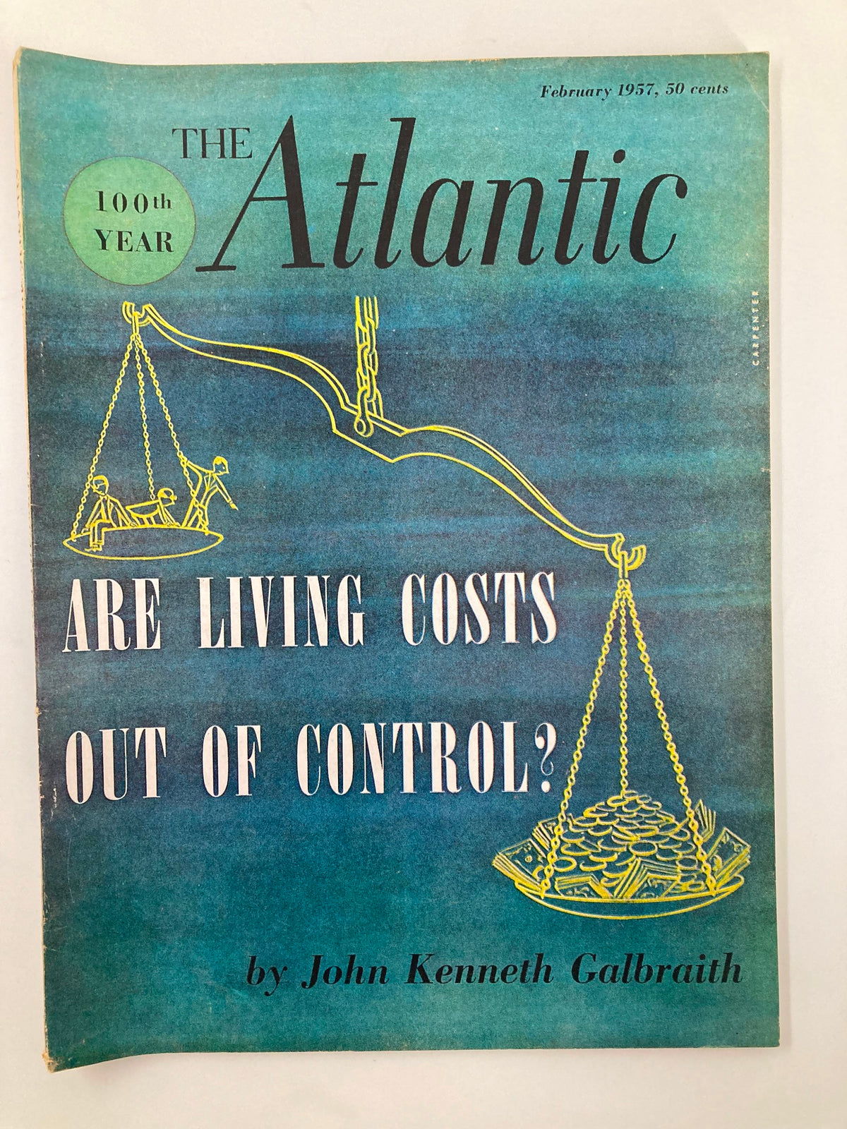 Cover of the February 1957 issue of The Atlantic Magazine featuring the title 'Are Living Costs Out of Control?' with a design showcasing a scale balancing people and coins, marking its 100th year.