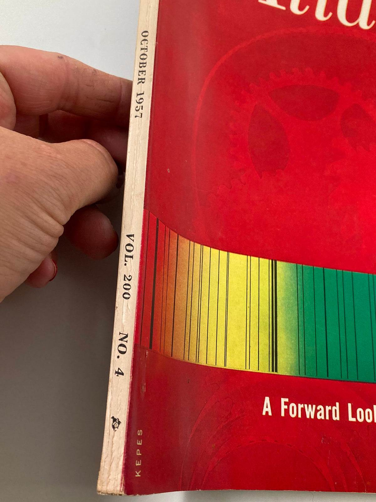 Close-up of the October 1957 issue of The Atlantic Magazine, titled 'A Forward Look at Science', featuring the issue information on the spine.