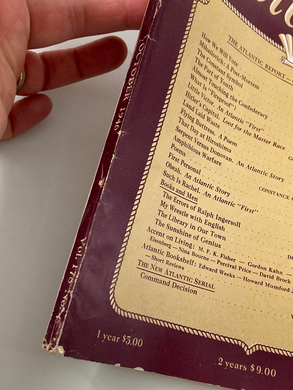 Close-up view of the spine of VTG The Atlantic Magazine October 1946 showcasing its vintage condition with visible wear.