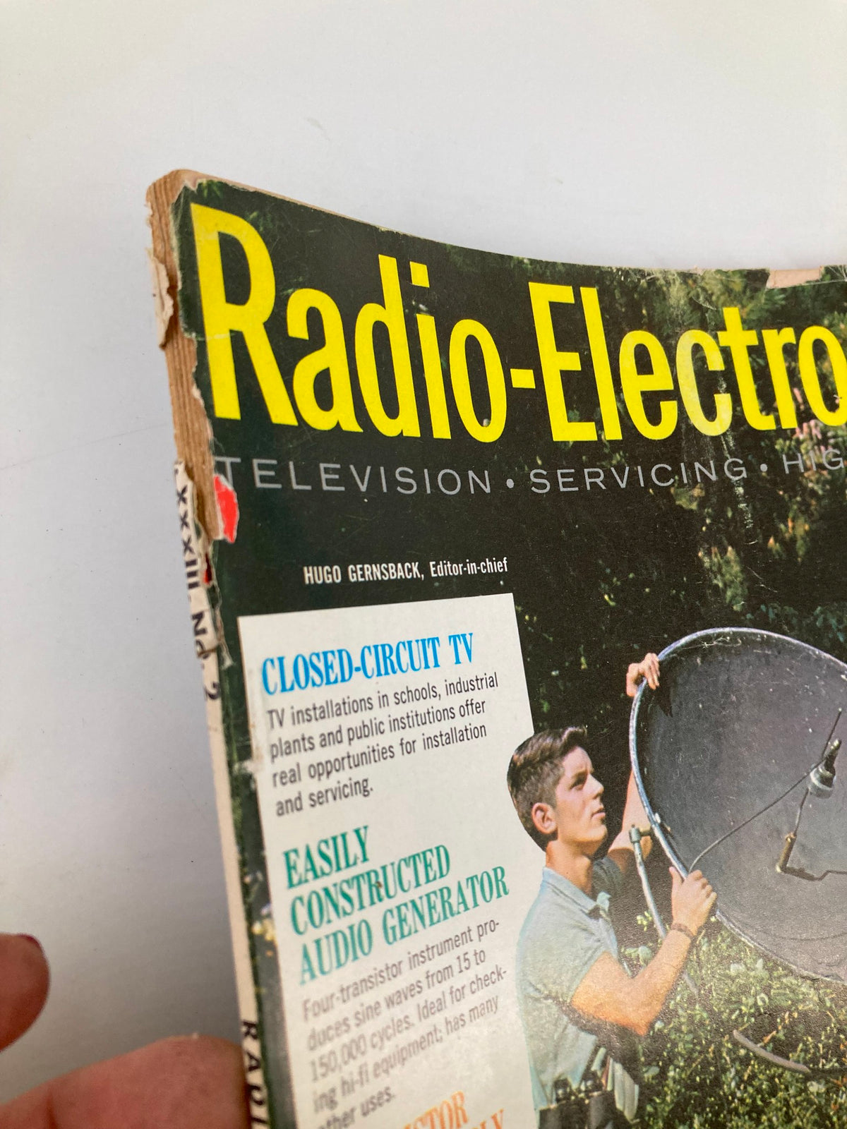 Close-up of the title and content on the cover of VTG Radio-Electronics Magazine February 1962, highlighting topics like closed-circuit TV and audio generators.