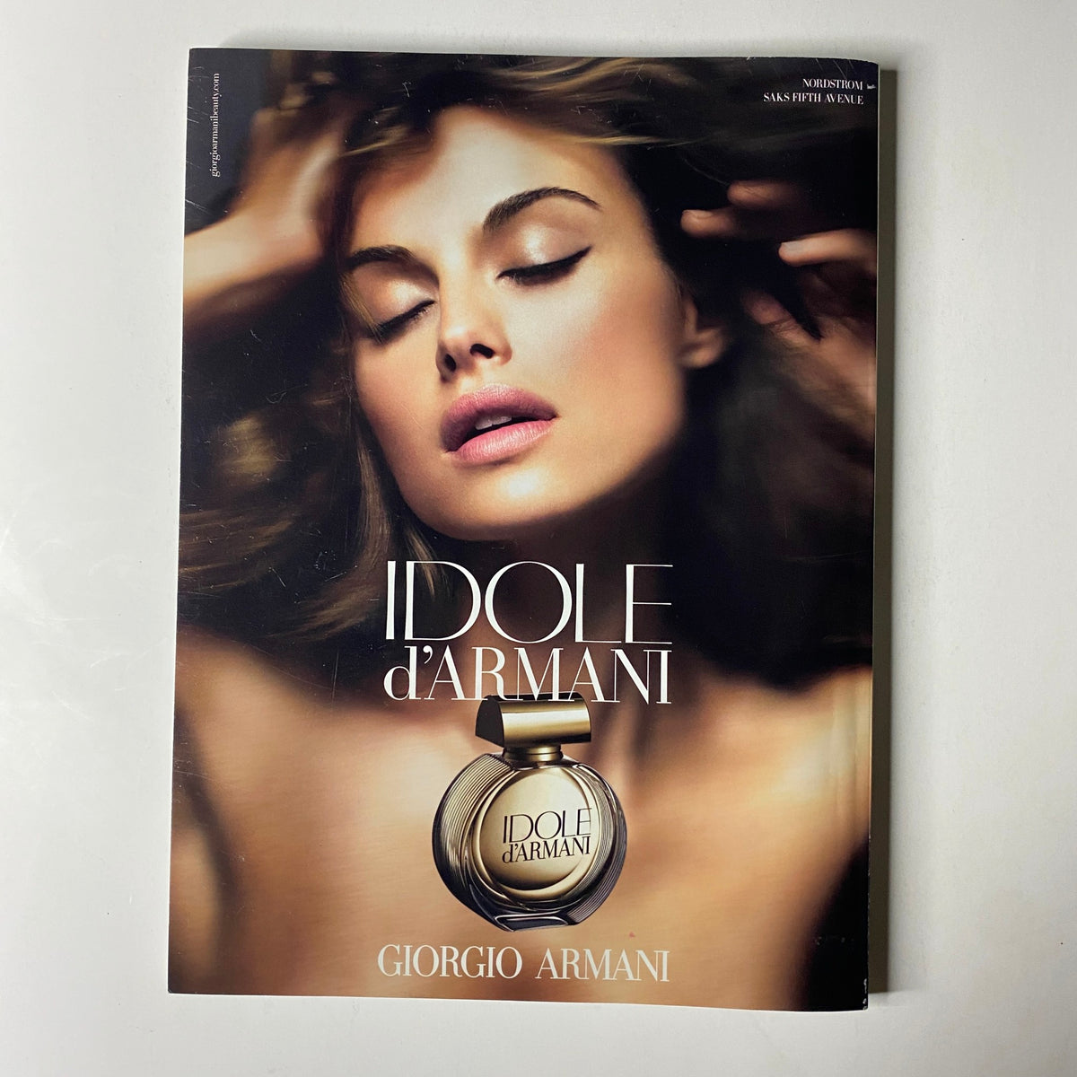 Vogue Magazine November 2009 displaying an advertisement for Giorgio Armani's Idole d'Armani perfume. This issue celebrates notable fashion icons Nicole Kidman and Marion Cotillard on its cover.