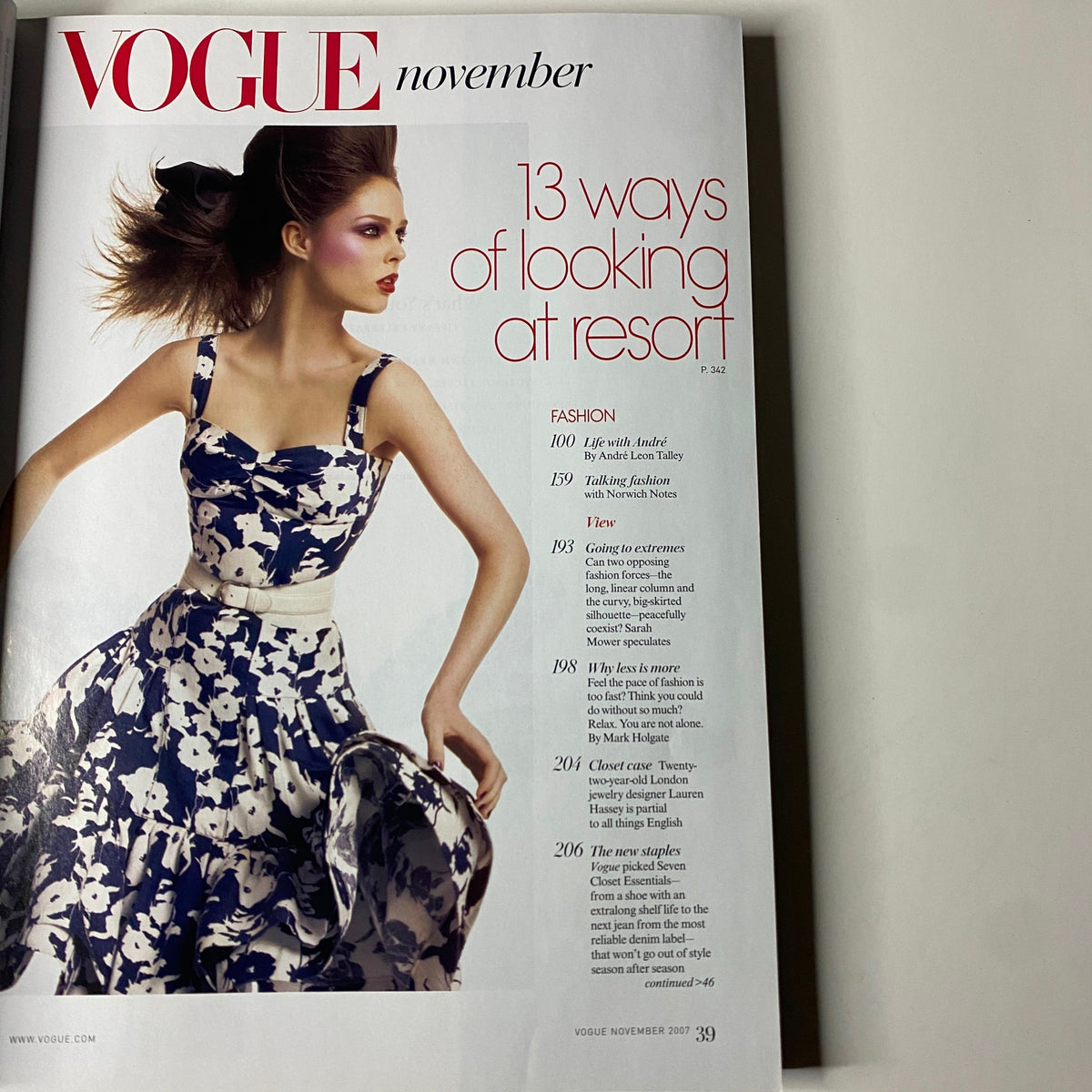 Inside page of Vogue Magazine November 2007 featuring the article '13 Ways of Looking at Resort,' accompanied by a fashionable model in floral attire.