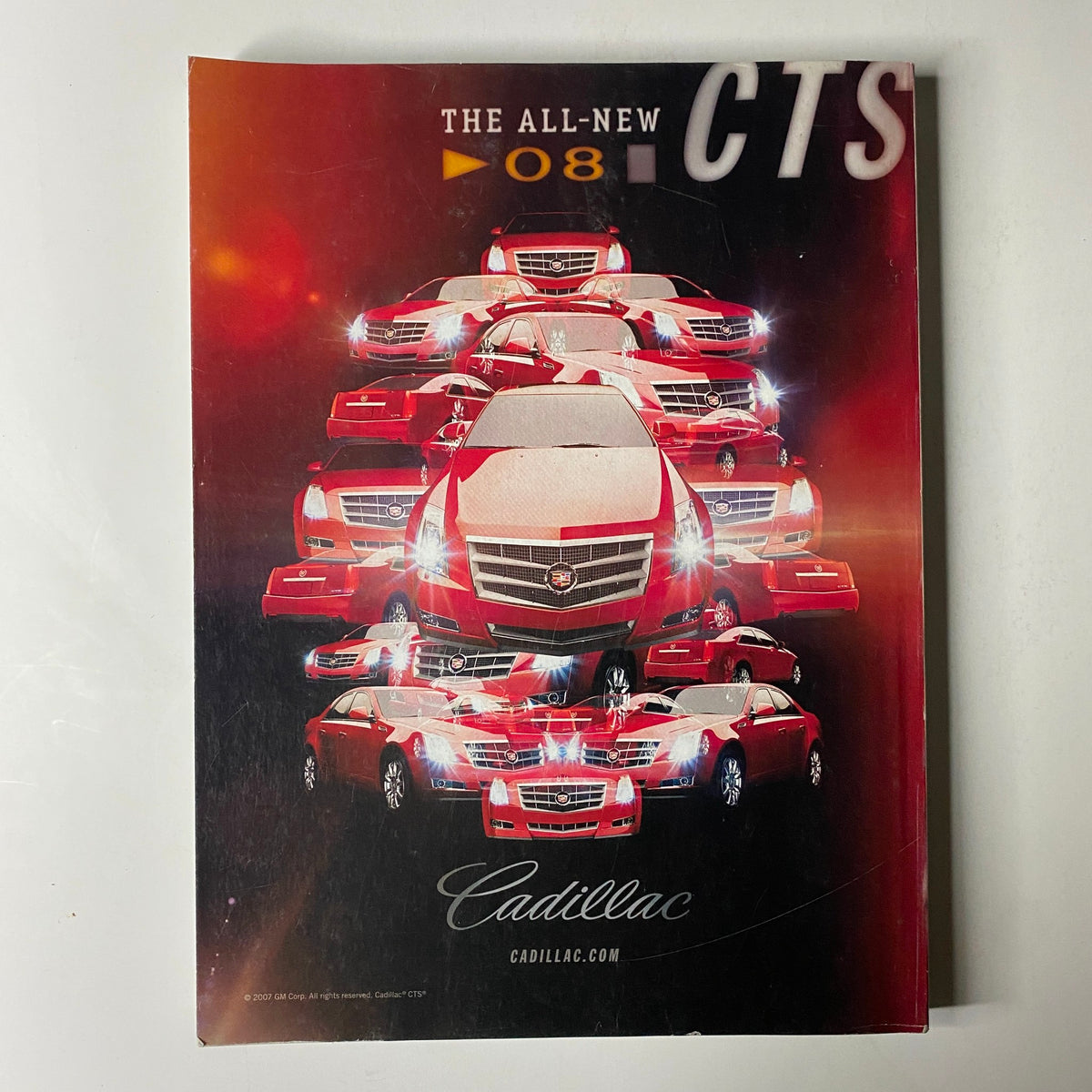Advertisement for the all-new Cadillac CTS 2008 showcasing a striking design of multiple cars stacked. Cover Title: Vogue Magazine November 2007 Jennifer Connelly Cover No Label VG.