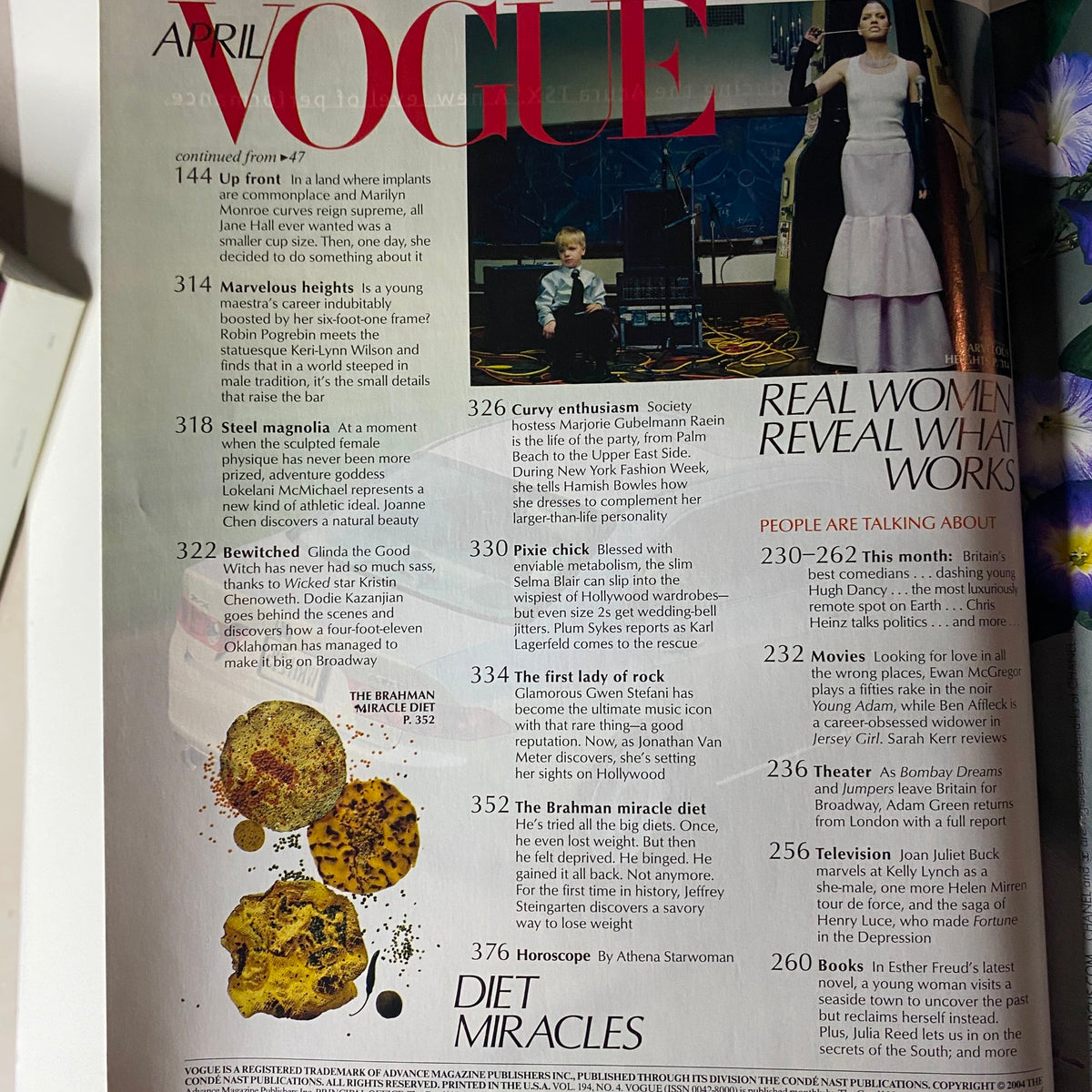 Continued contents page of April 2004 Vogue Magazine featuring articles on fashion and health, including 'Marvelous Heights' and 'Epic Proportions'.