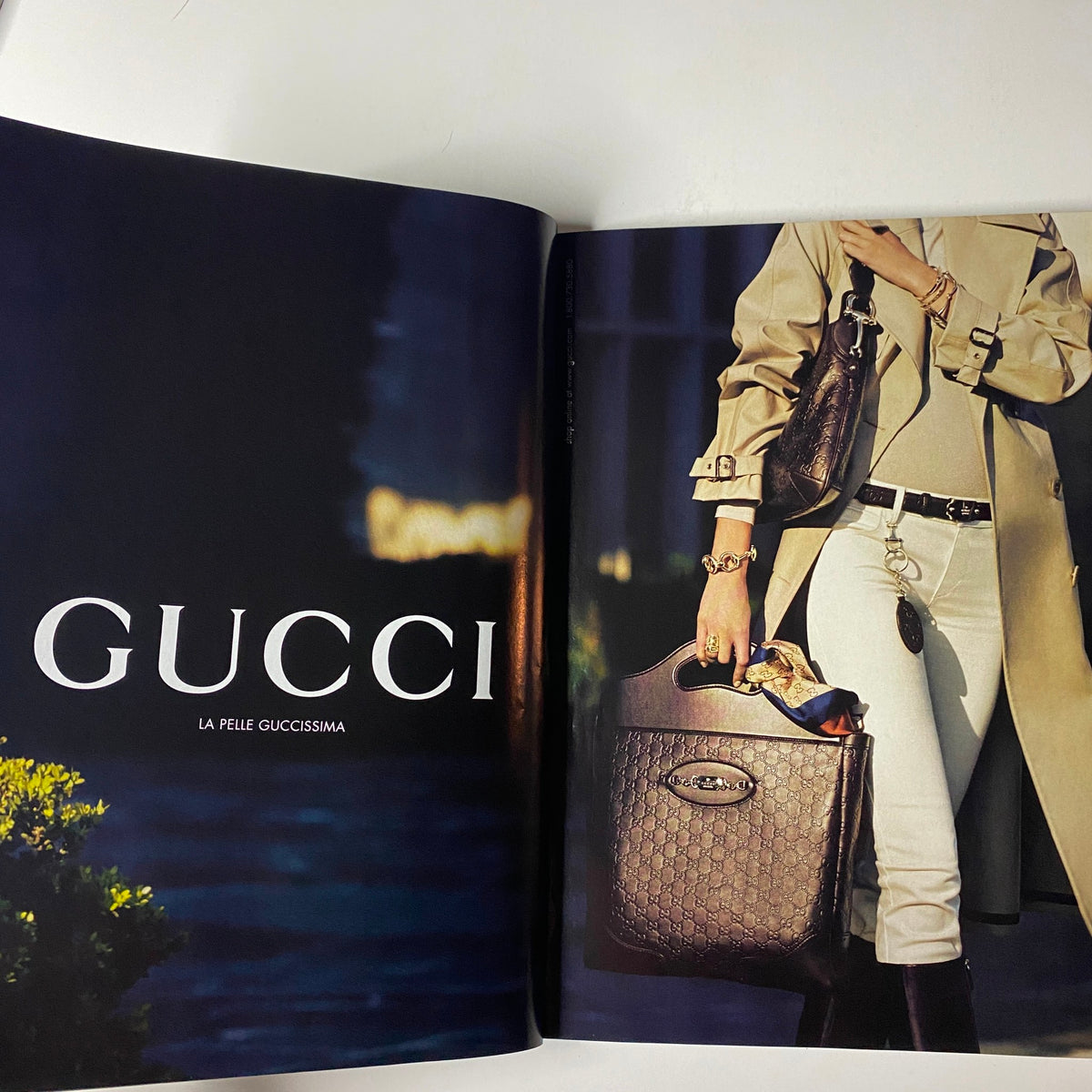 Vogue Magazine August 2005 Gucci advertisement showcasing elegant fashion with a focus on premium accessories in a luxurious setting.