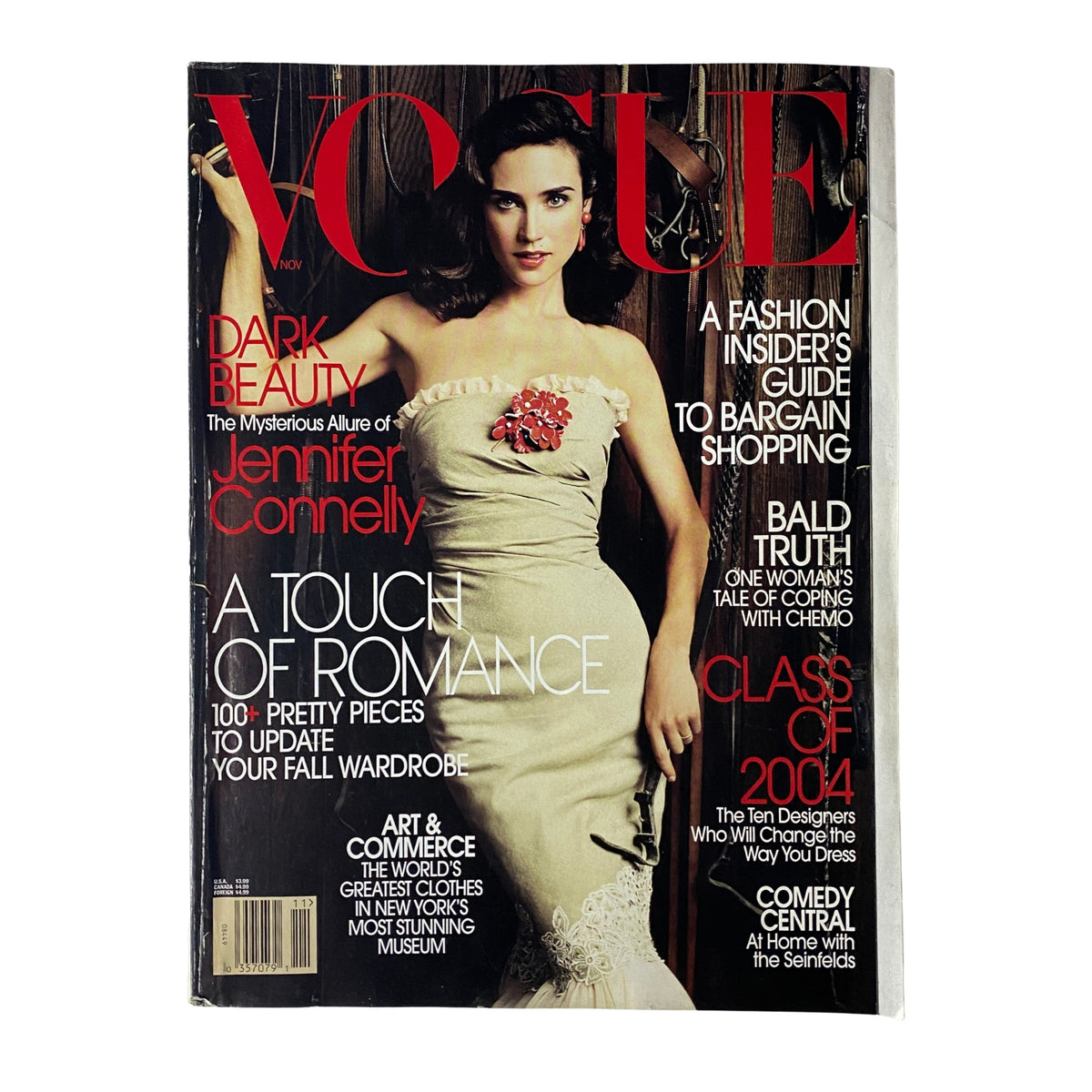 Vogue Magazine November 2004 featuring Jennifer Connelly on the cover, showcasing fashion themes like dark beauty and romance, and celebrating emerging designers.