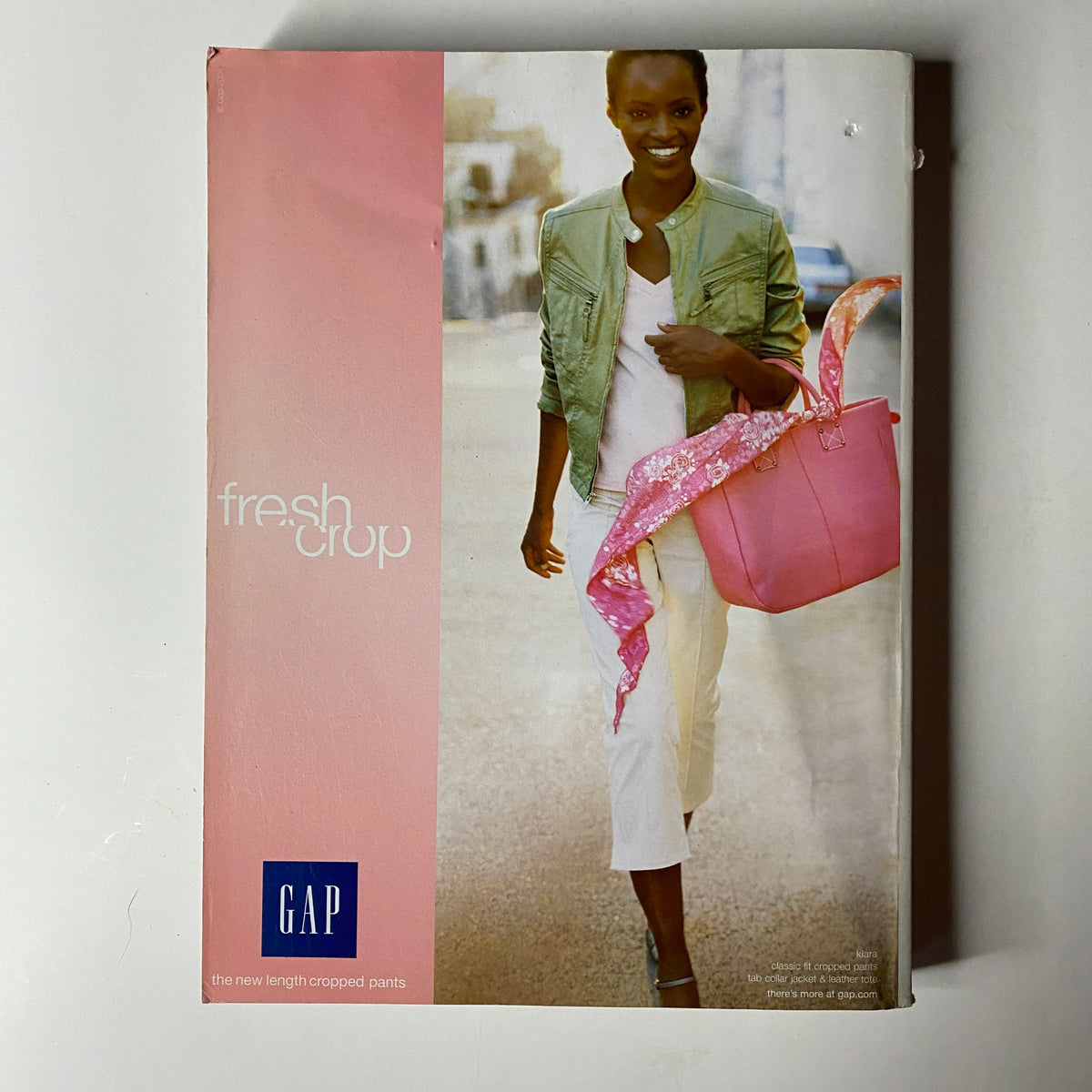 GAP advertisement featured in Vogue Magazine March 2004, showcasing a model in stylish apparel, promoting cropped pants.