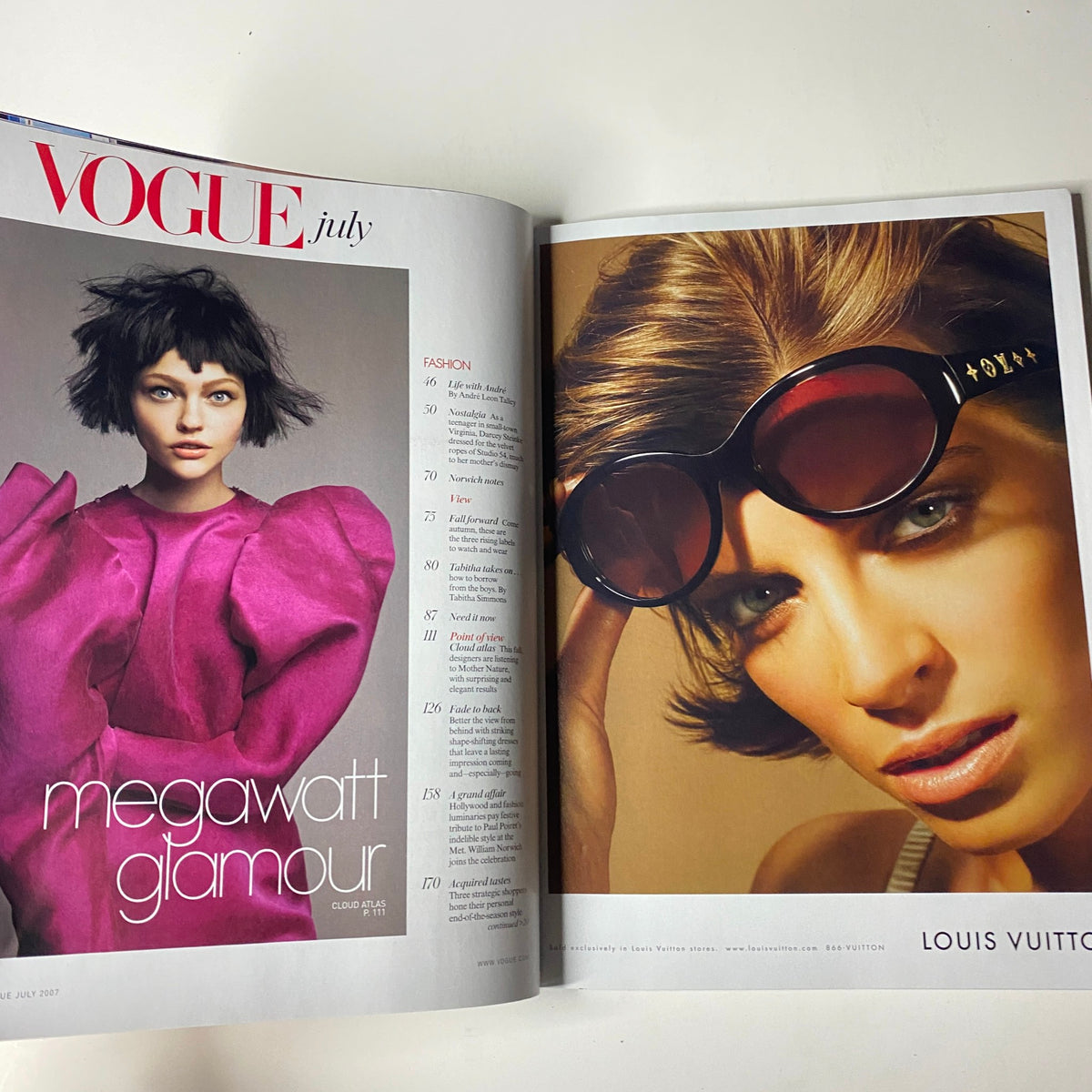 Fashion editorial in Vogue Magazine July 2007 displaying vibrant outfits, including a feature on megawatt glamour.