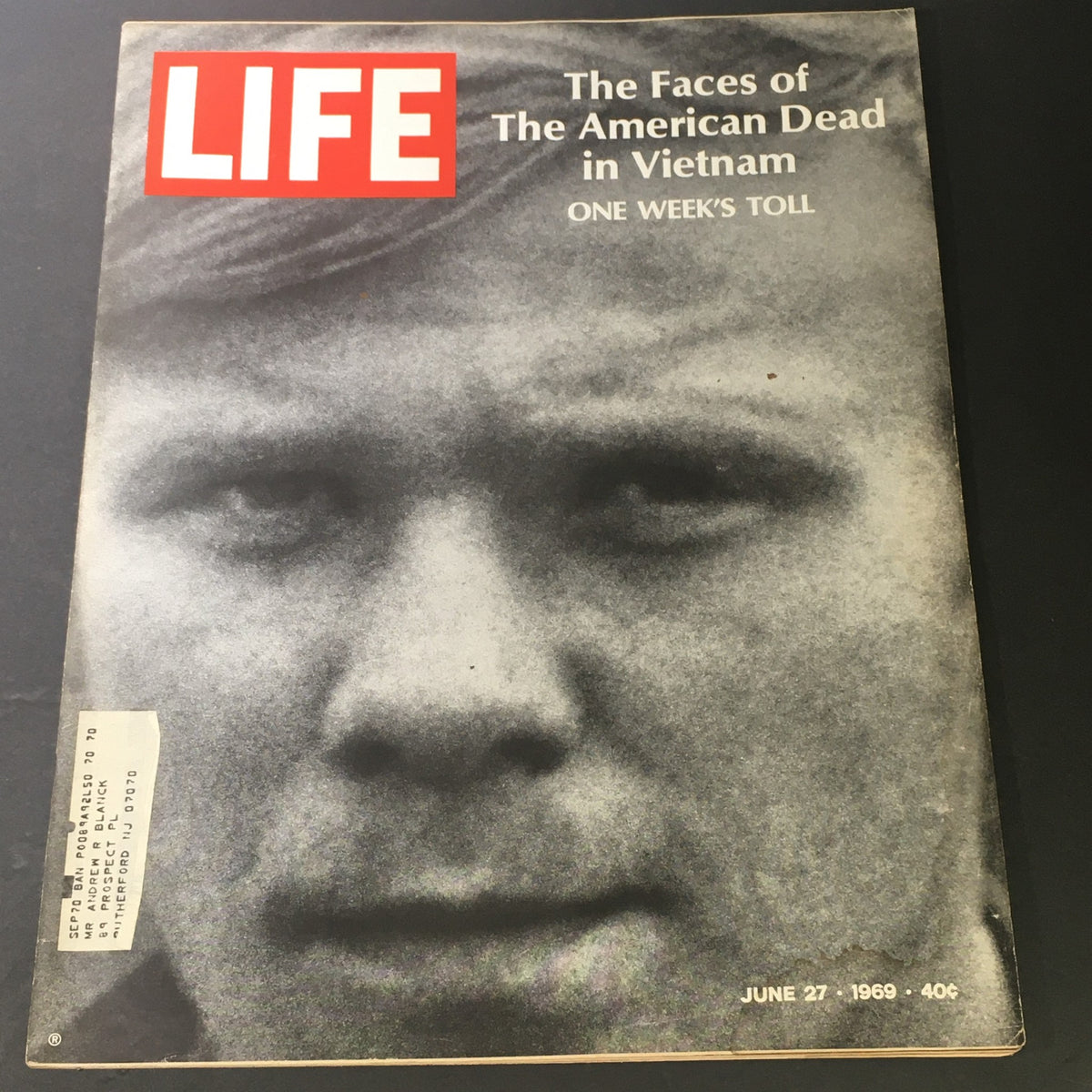 Cover of VTG Life Magazine from June 27, 1969, featuring the title 'The Faces of The American Dead in Vietnam' with a close-up image of a solemn face, highlighting the theme of loss and sacrifice during the Vietnam War.