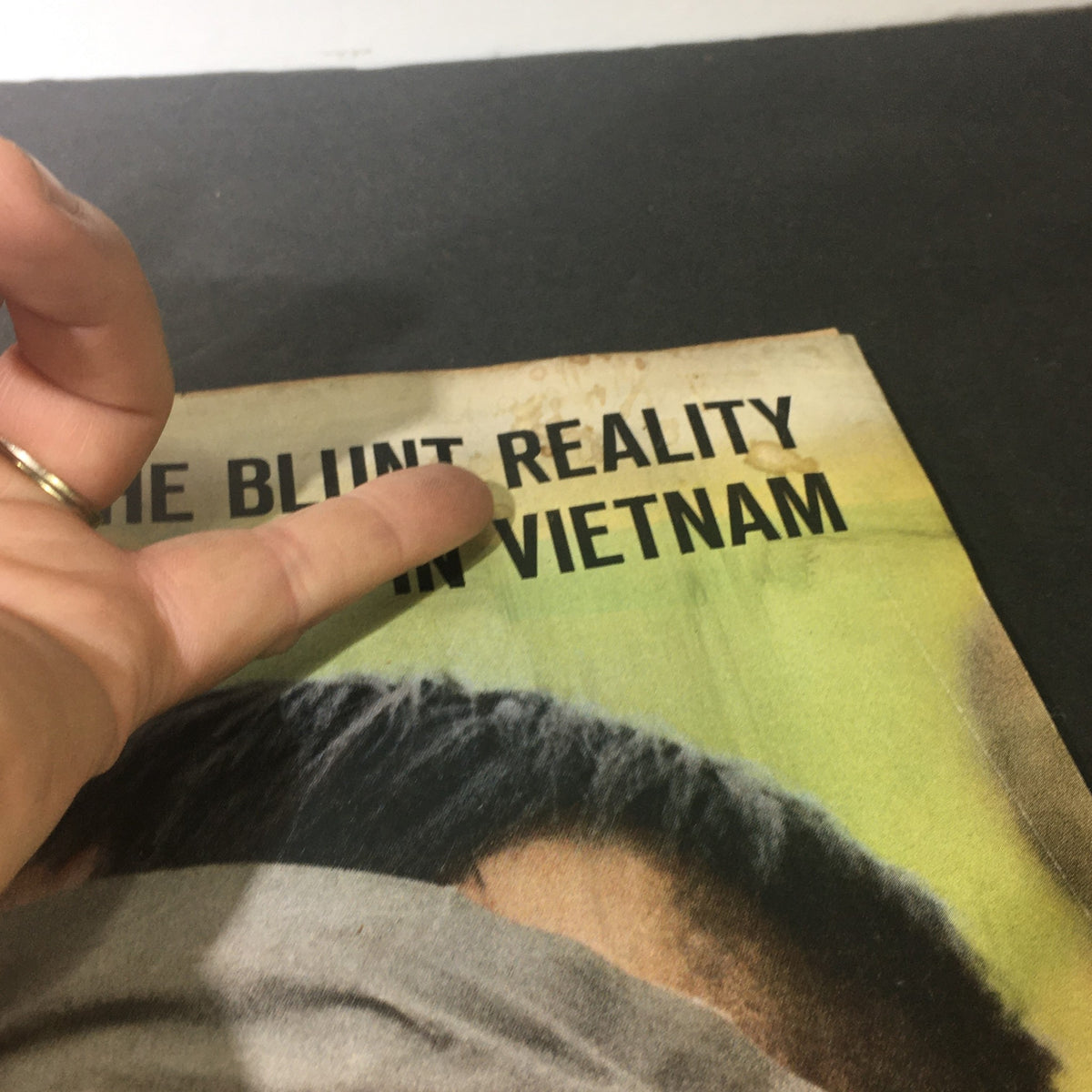 Close-up of the title from the cover of the VTG Life Magazine November 26 1965, emphasizing 'The Blunt Reality Of War In Vietnam'. The image shows the distressed title area with slight wear effects.