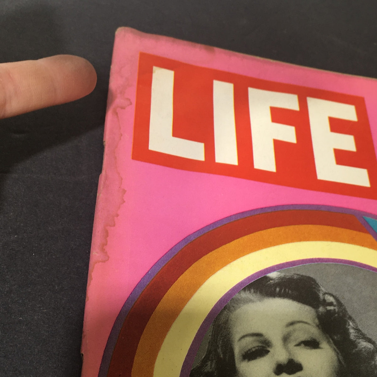Close-up detail of the cover of VTG Life Magazine February 19, 1971, highlighting edges of the magazine with slight wear, emphasizing its vintage condition.