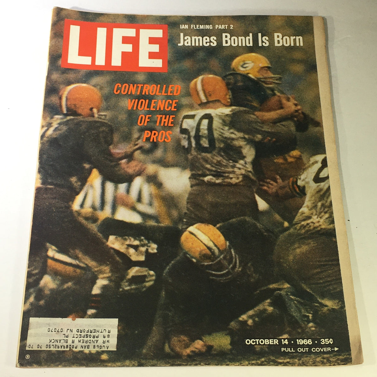 Vintage October 14, 1966 Life Magazine cover featuring Ian Fleming Part 2 - James Bond is Born, showcasing a sports scene with players in action.