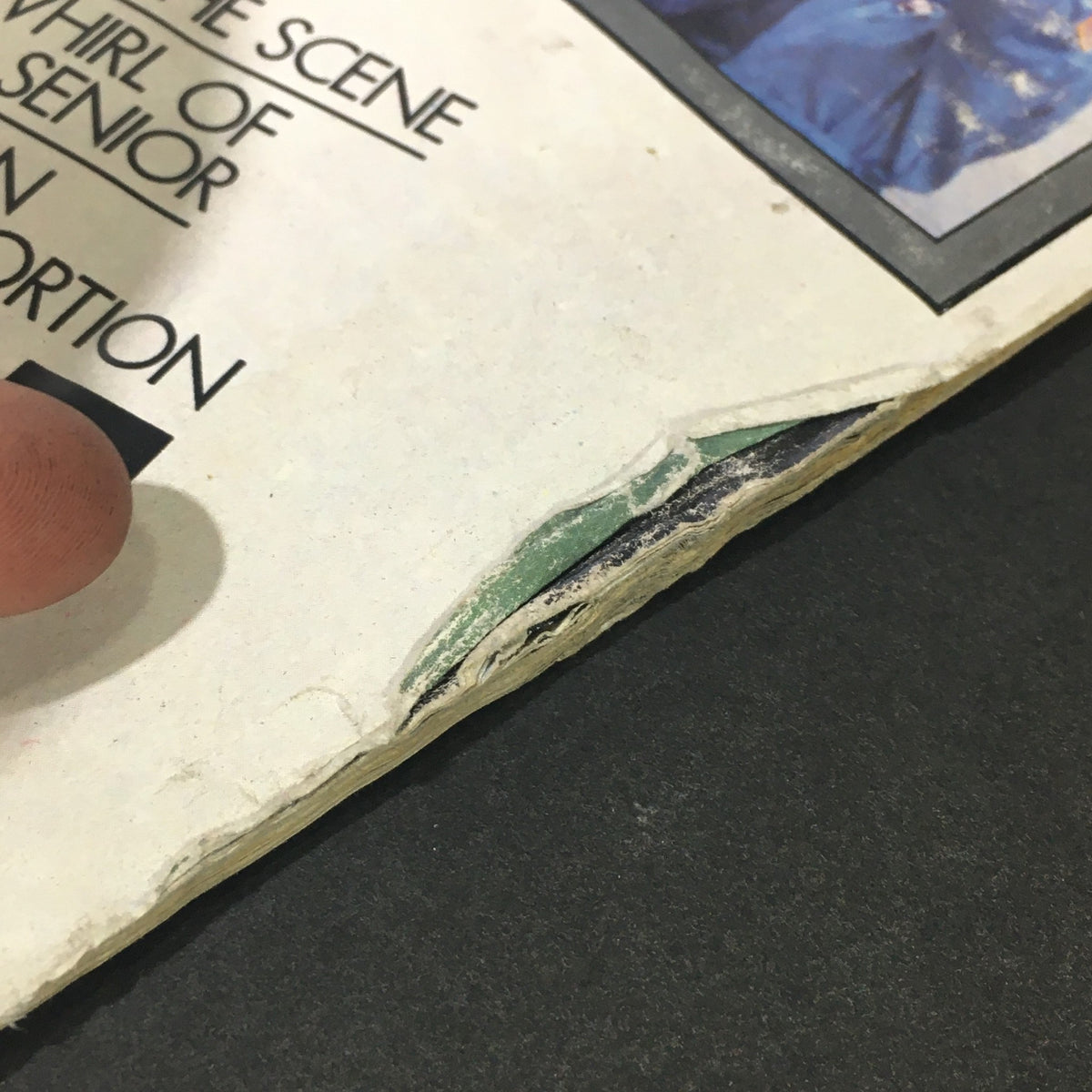 Detail of the corner of the Vintage Life Magazine March 1986, showing additional wear and damage typical of vintage magazines.