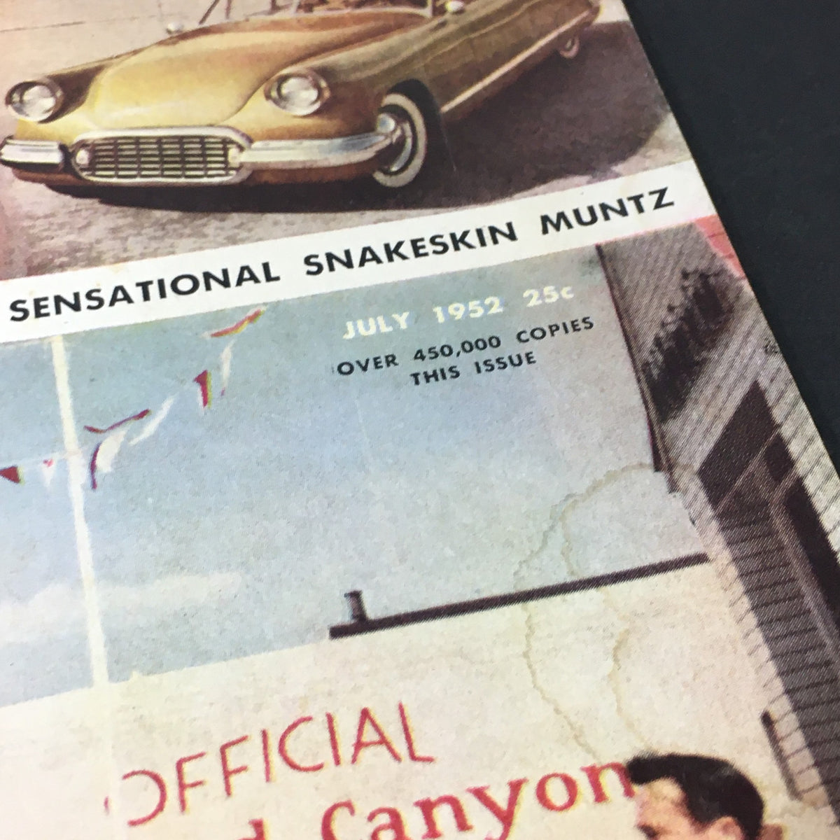 Close-up of the Motor Trend Magazine July 1952 cover highlighting the sensational Snakeskin Muntz car and details like the issue date and circulation, emphasizing vintage automotive culture.