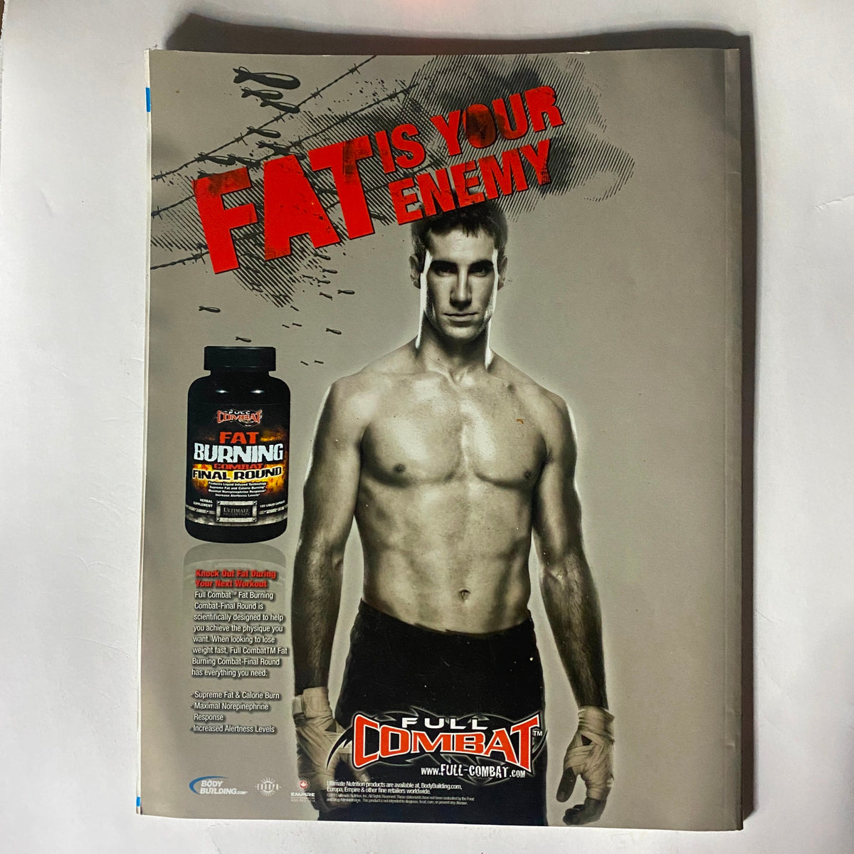 Fighters Only Magazine October 2011 featuring Jason Miller on the cover, showcasing a muscular male fighter standing confidently with a fat-burning supplement advertisement in the background.