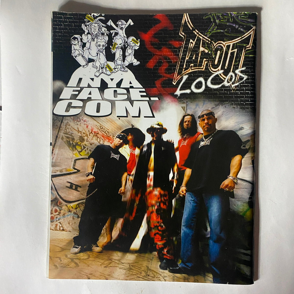 Tapout magazine cover featuring the Tapout Crew, representing MMA culture and lifestyle, highlighting the brand's influence in the fight community.