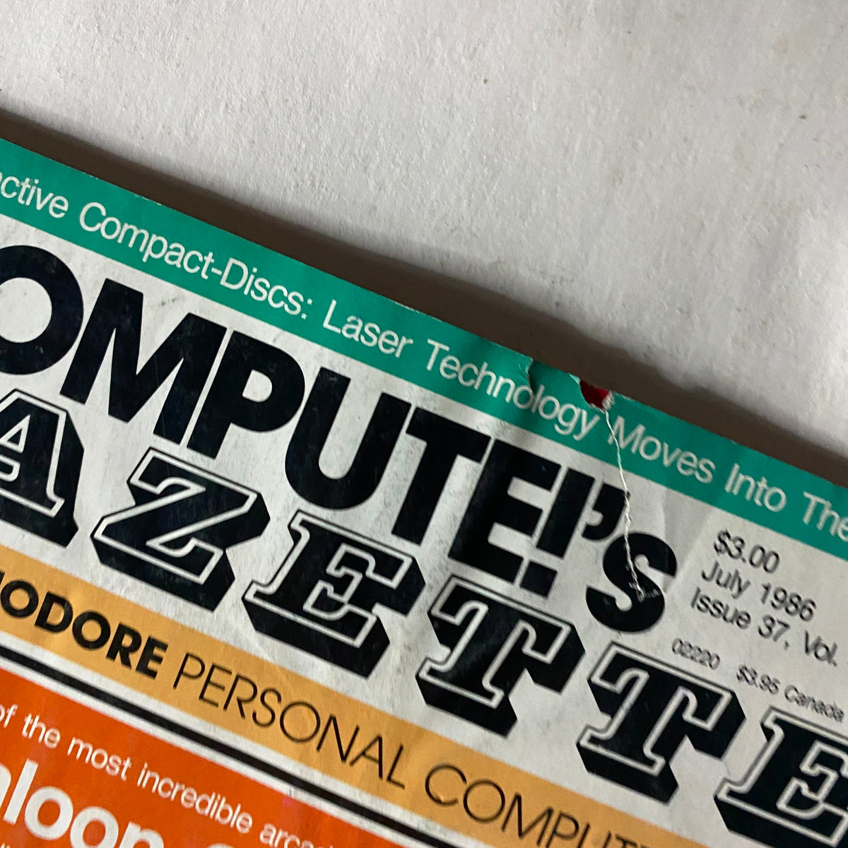 Close-up view of the Compute's Gazette Magazine July 1986 cover highlighting the Power Basic 64 Ram Disk feature.