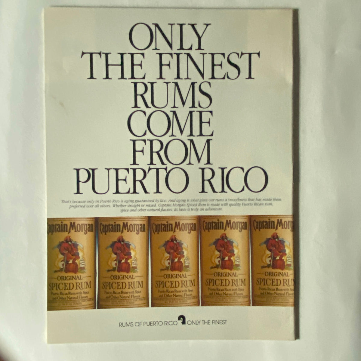 Back page advertisement from Entertainment Weekly Magazine January 20 1995, promoting Captain Morgan rum with a stylish design emphasizing quality rum from Puerto Rico.