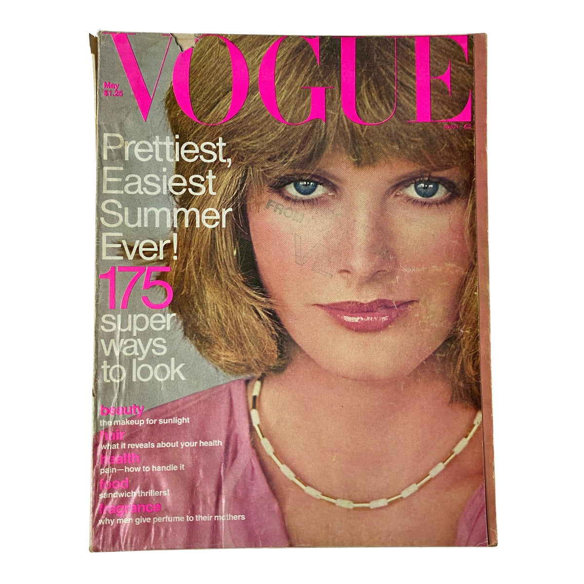 Vogue Magazine May 1976 Rene Russo Cover featuring bold pink lettering and a youthful model showcasing summer beauty tips.