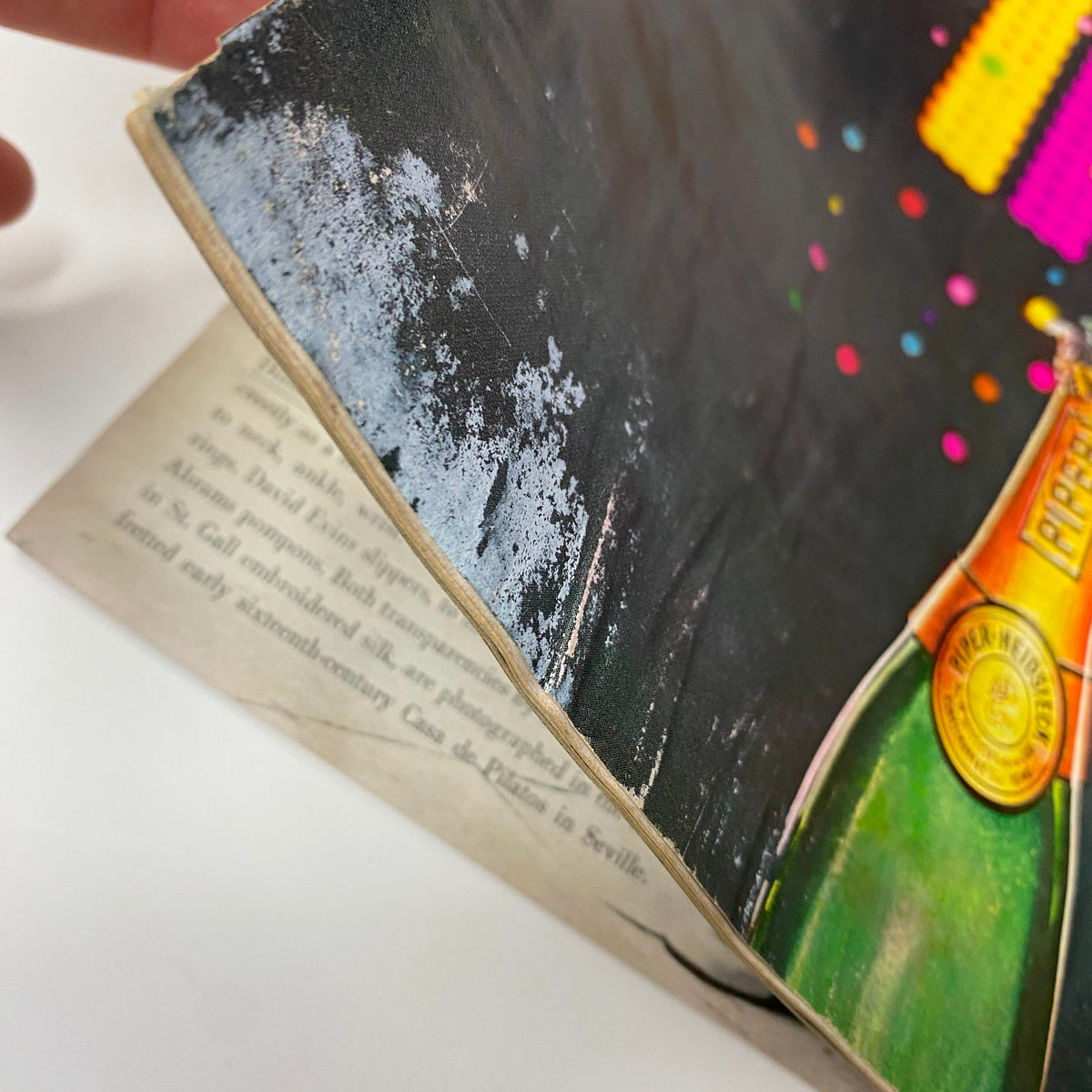 Close-up view of Vogue Magazine June 1969 Windsor Elliot cover with visible wear, highlighting water damage and creases, emphasizing the magazine's condition as an acceptable collectible.