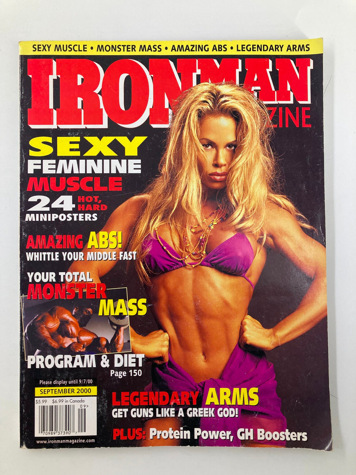 Ironman Magazine September 2000 cover featuring a muscular female model in a purple bikini, showcasing the theme 'Sexy Feminine Muscle', highlighting bodybuilding culture and fitness.