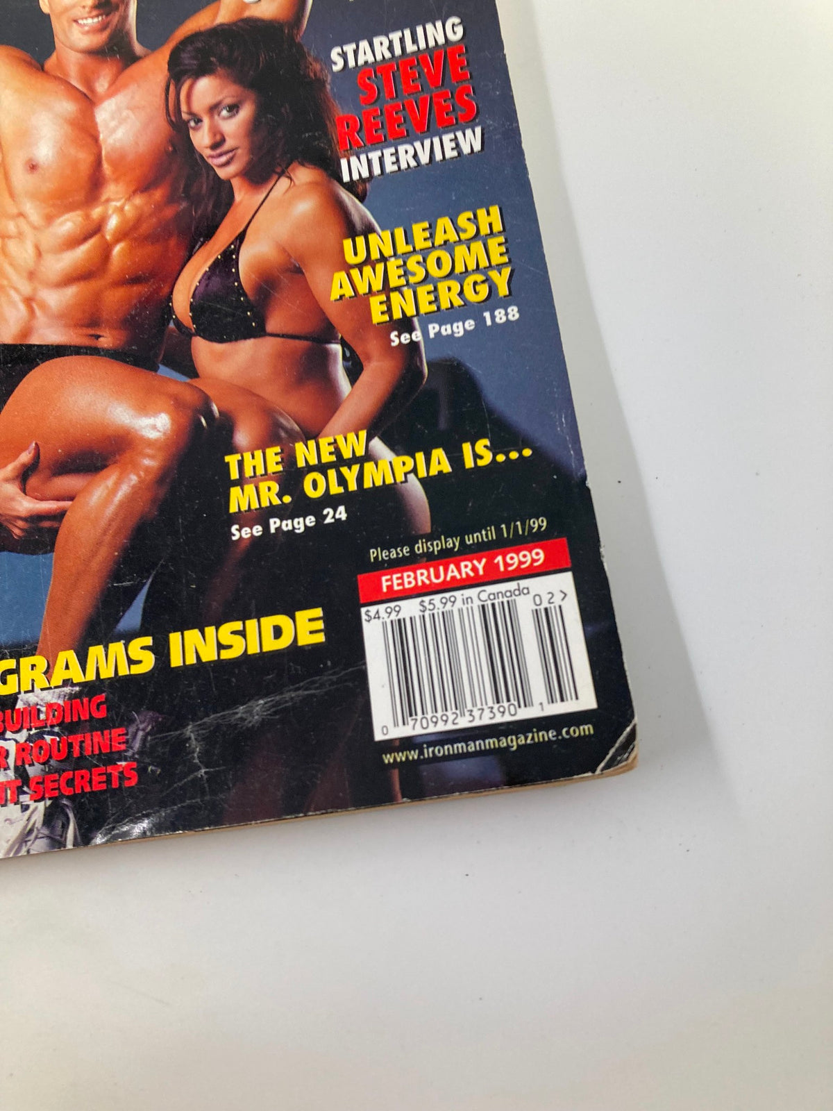 Ironman Magazine February 1999 cover featuring Mike O'Hearn and Christina Bybee; highlights include discussions on bodybuilding techniques and tips for enhancing energy.