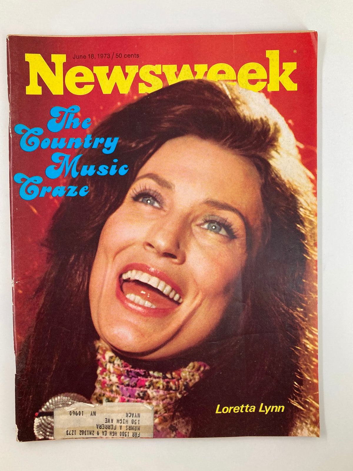 Vintage Newsweek magazine cover from June 18, 1973, featuring Loretta Lynn, titled 'The Country Music Craze'. The cover highlights Lynn's smile and captures the essence of the 1970s country music scene.