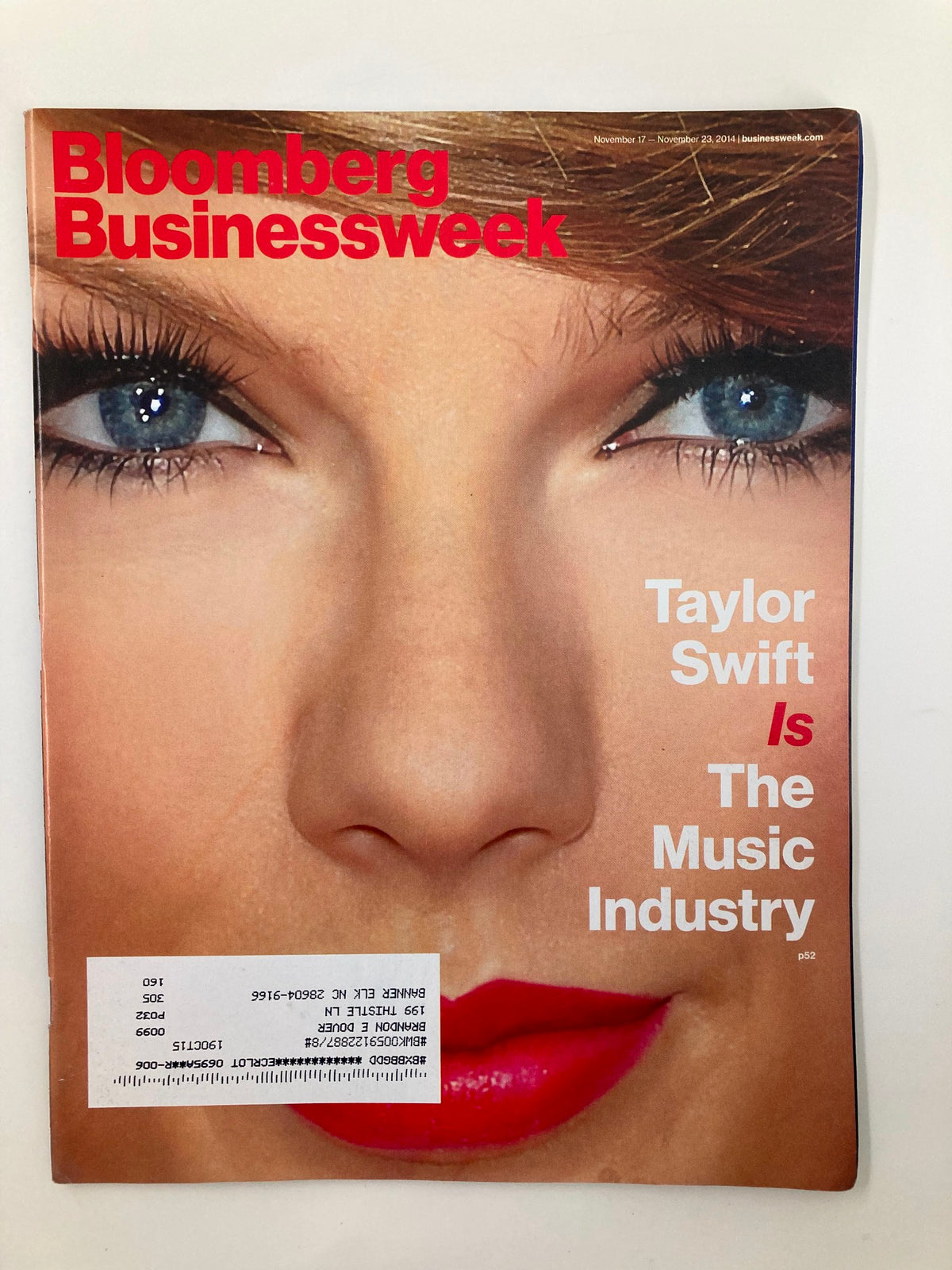Bloomberg Businessweek Magazine cover from November 17, 2014, featuring Taylor Swift with the headline 'Taylor Swift Is The Music Industry' highlighting her impact on the music world.