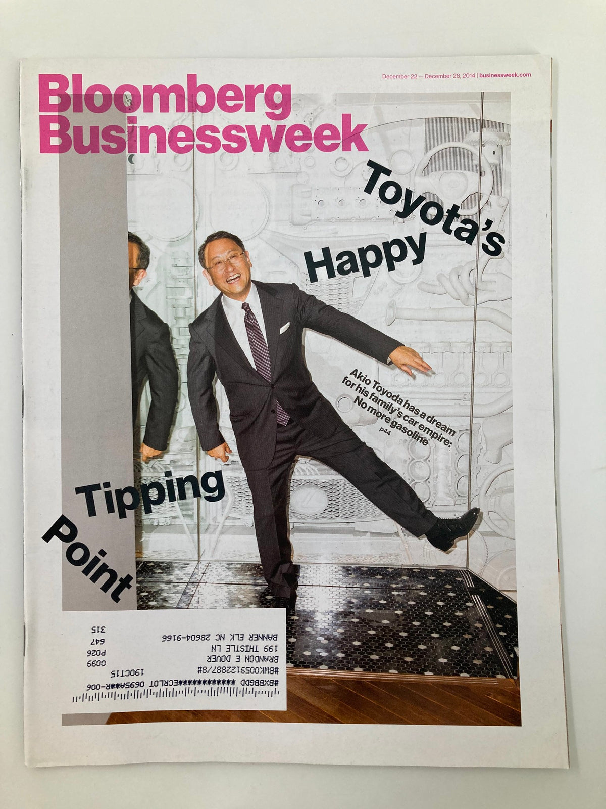 Bloomberg Businessweek Magazine December 22, 2014 cover featuring Akio Toyoda, showcasing his vision for Toyota's innovation and sustainability.