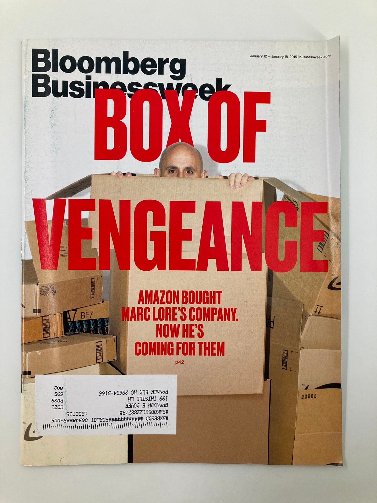 Bloomberg Businessweek Magazine January 12 2015 cover featuring the headline 'Box of Vengeance: Amazon Bought Marc Lore's Company' with the image of a person holding boxes.