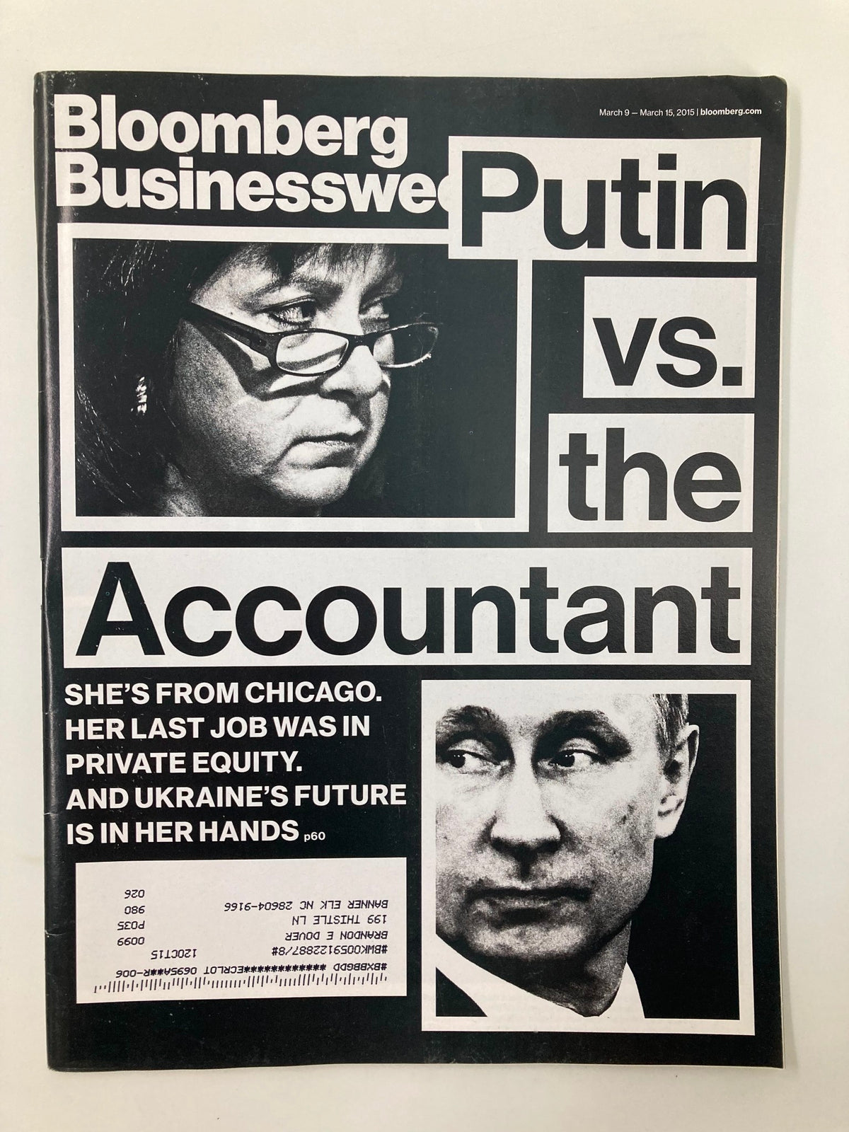 Bloomberg Businessweek Magazine March 9 2015 cover featuring the headline 'Putin vs. the Accountant' and a portrait of Vladimir Putin alongside an image of a female accountant, highlighting political themes and economic power dynamics.