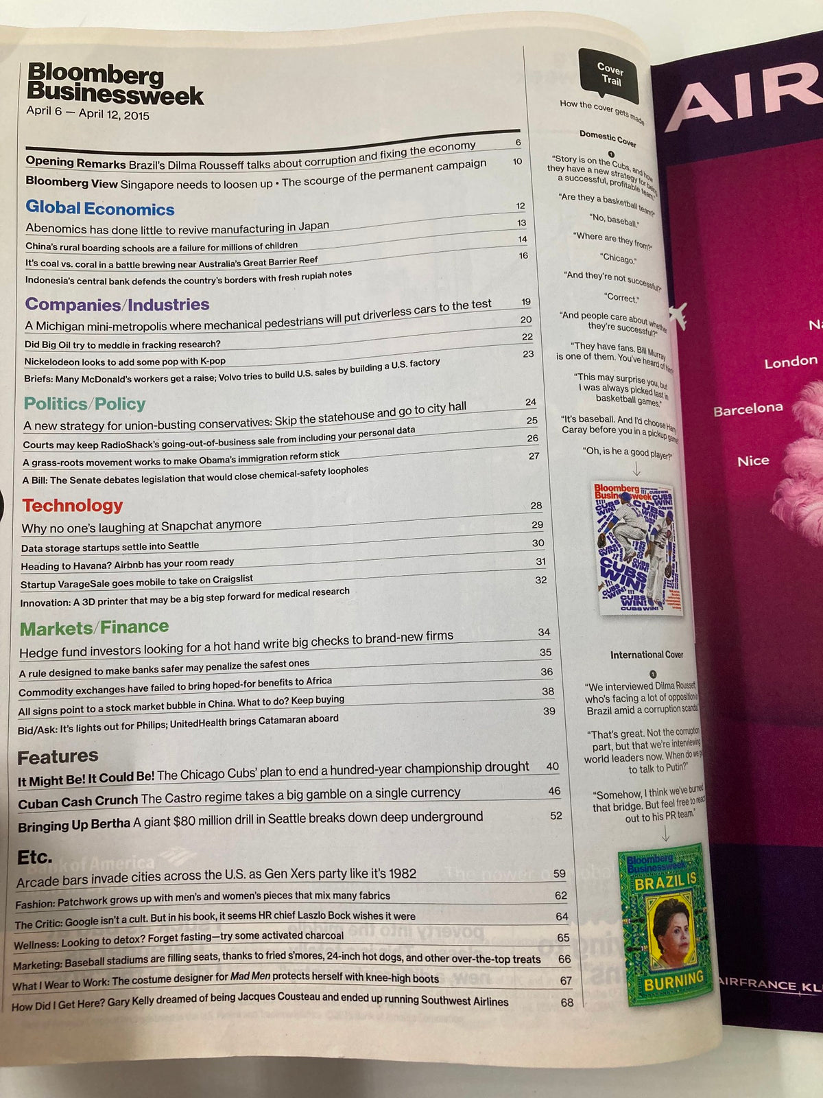 Interior page of Bloomberg Businessweek Magazine April 6 2015 featuring various articles and topics relevant to global economics, technology, and industry insights.