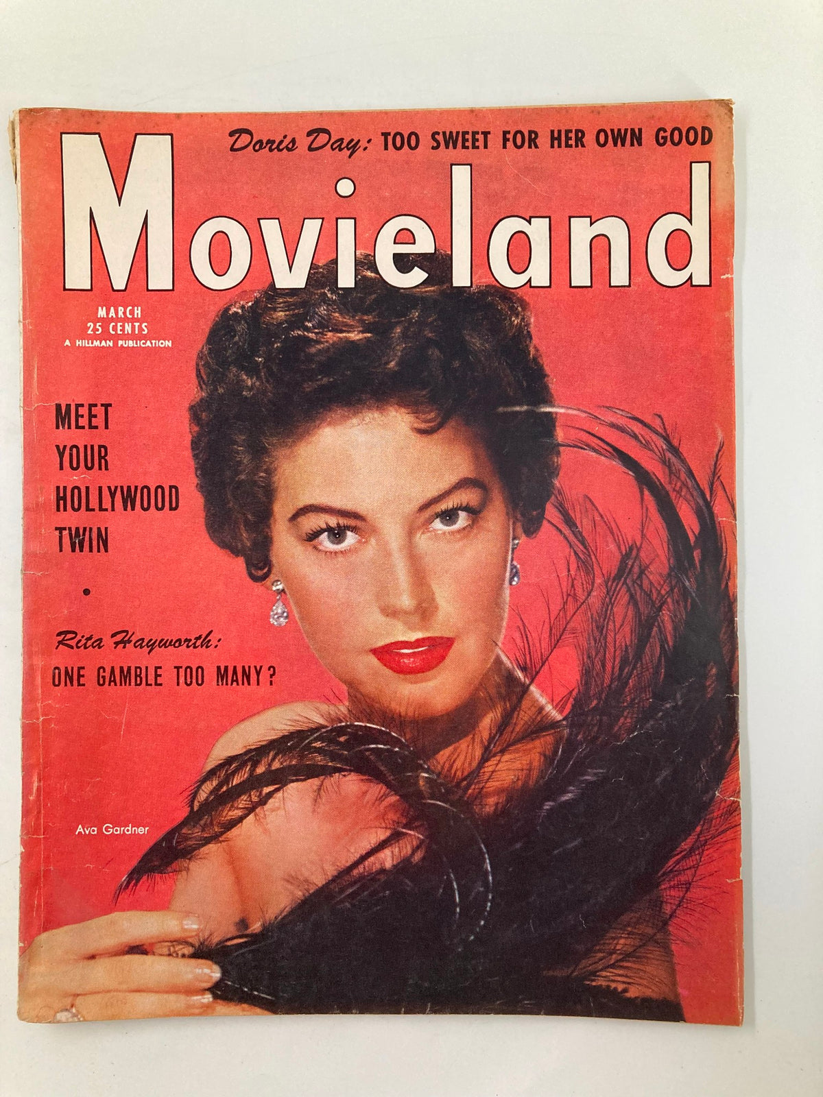 VTG Movieland Magazine March 1954 cover featuring Ava Gardner and Rita Hayworth, showcasing classic Hollywood glamour.