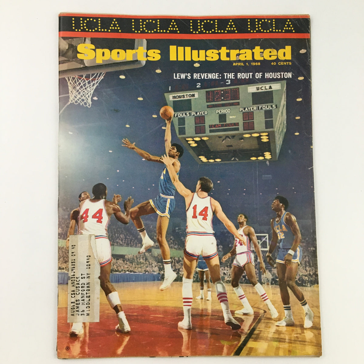 Sports Illustrated Magazine April 1 1968 featuring Lew Alcindor, aka Kareem Abdul-Jabbar. The magazine cover depicts a dynamic basketball scene, showcasing Alcindor in action during a game, with recognizable players and a scoreboard in the background.
