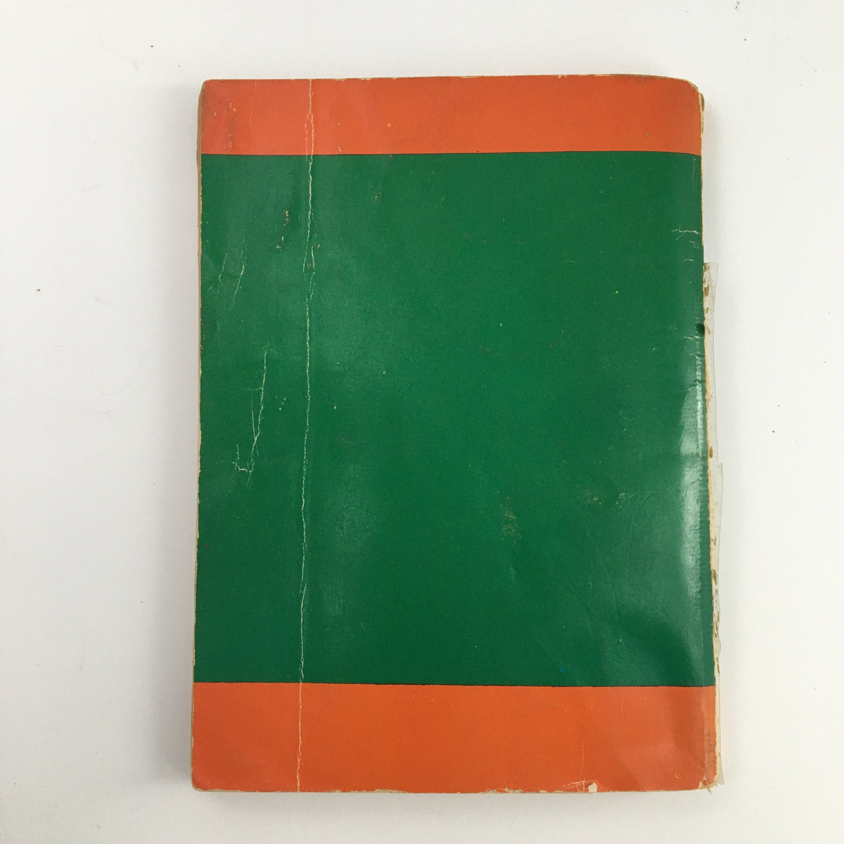 Back cover of the 1952 Major League Baseball Official Rules & Stories, featuring a worn green and orange design.