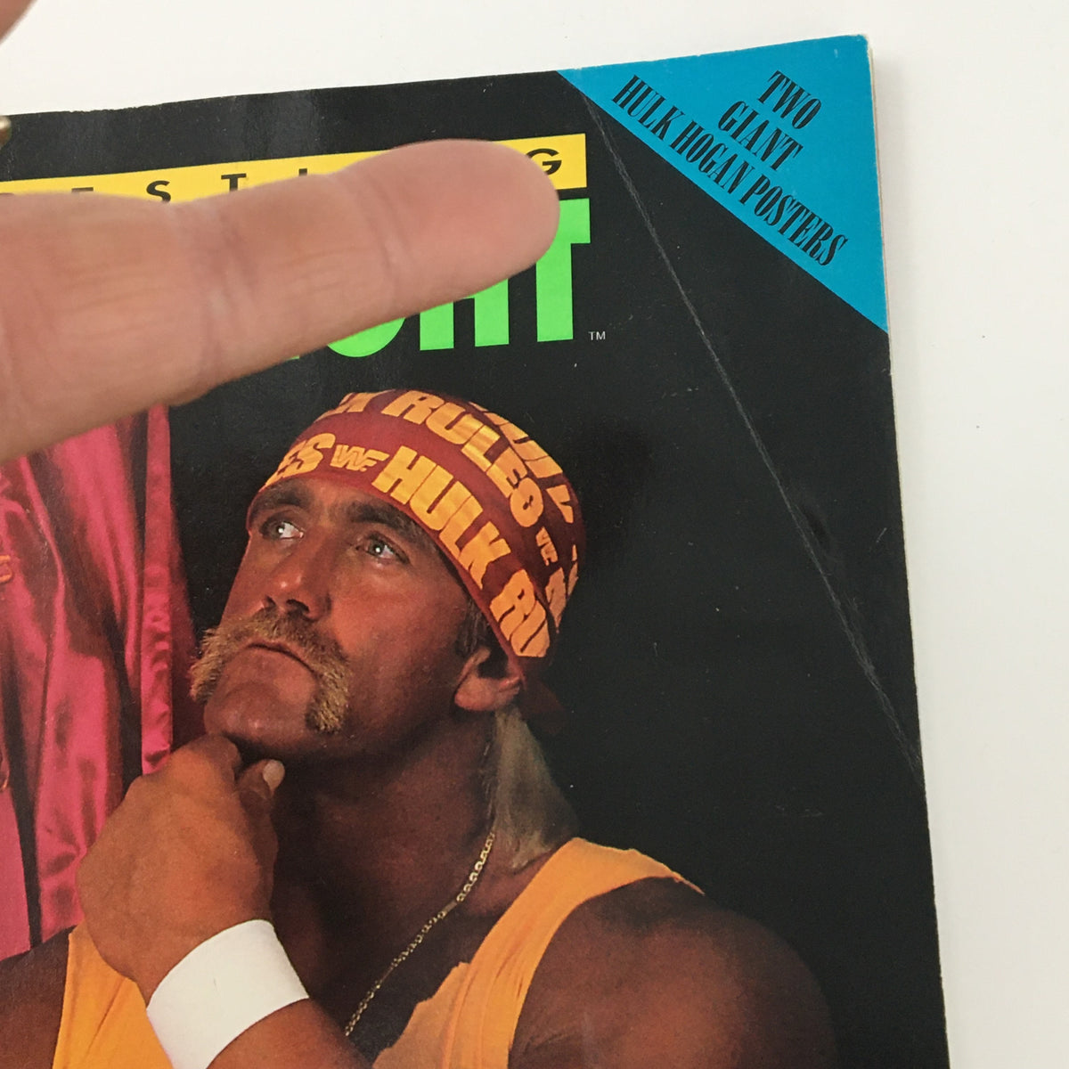 Close-up detail of WWF Wrestling Spotlight Magazine 1991 Vol #21 cover highlighting Hulk Hogan with a focus on the title and vibrant colors.